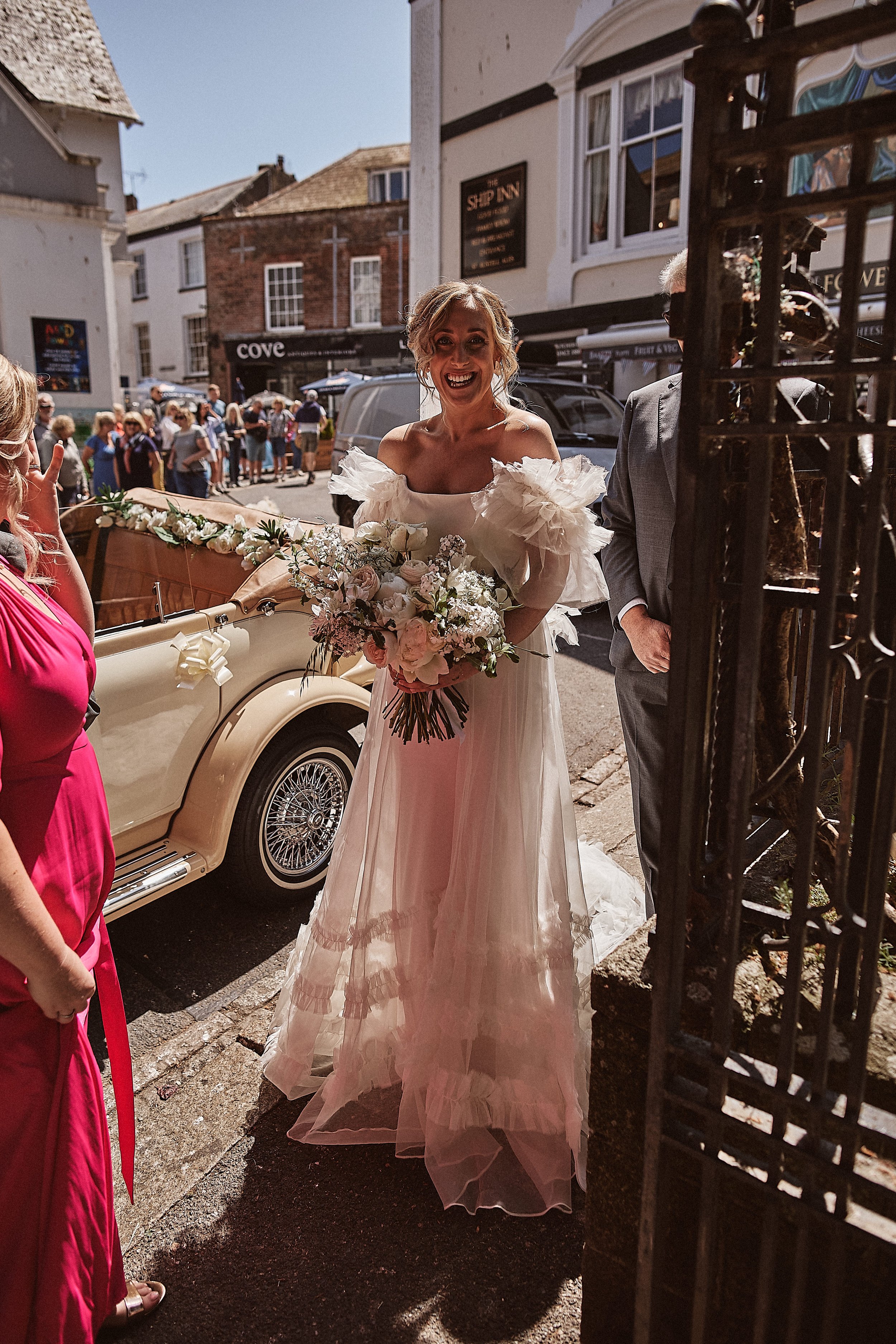 Beautiful bride Jess wears the Mayfair dress and Dandelion veil | Wedding dresses by Halfpenny London