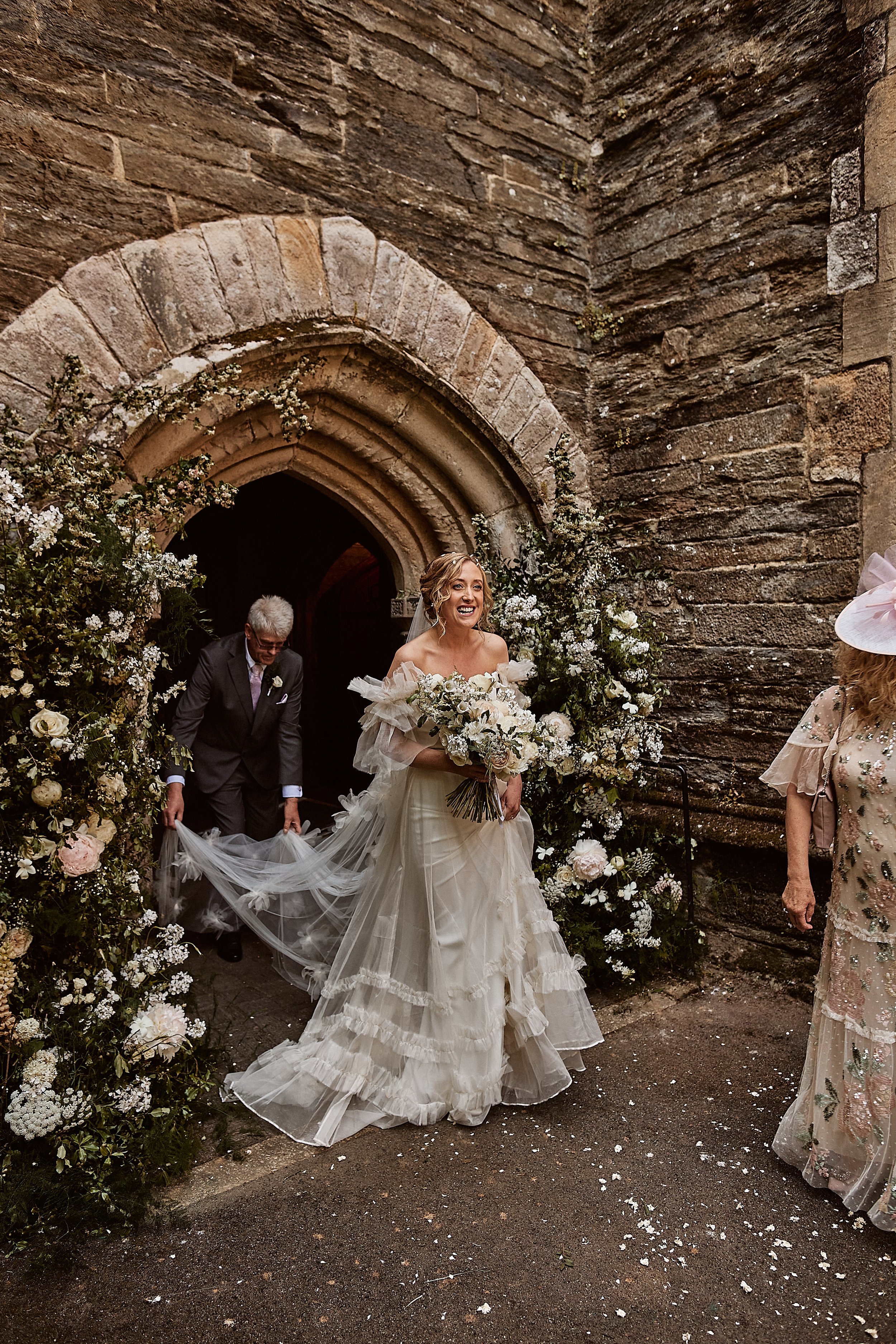 Beautiful bride Jess wears the Mayfair dress and Dandelion veil | Wedding dresses by Halfpenny London