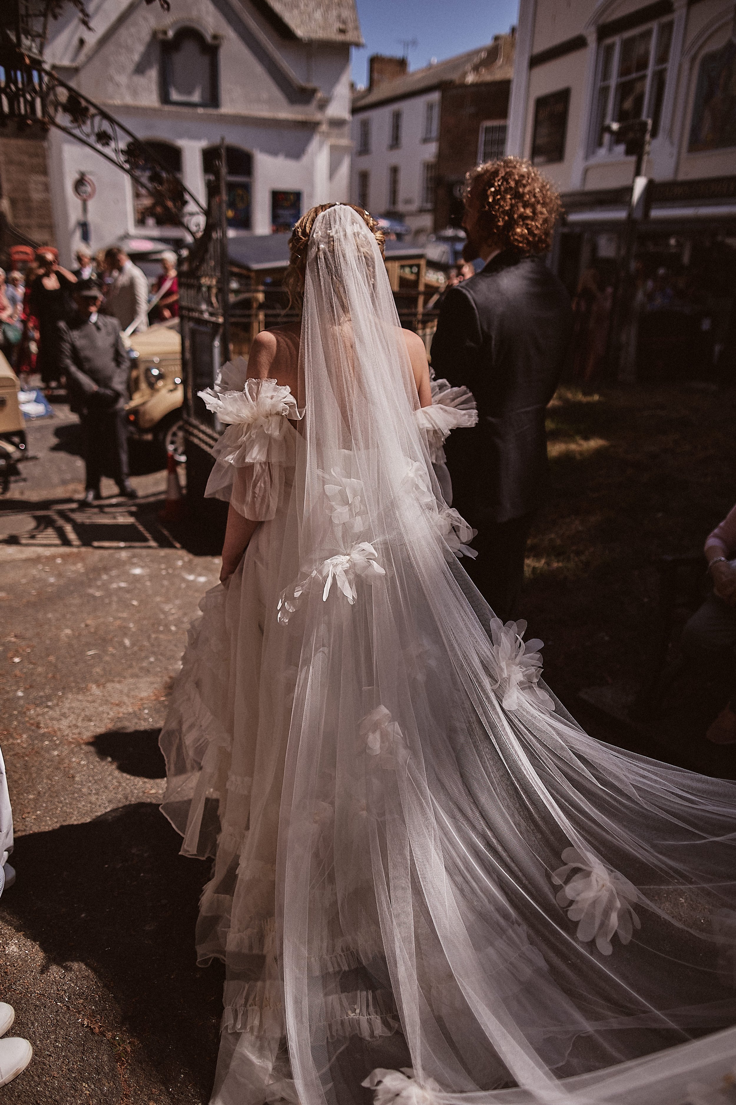 Beautiful bride Jess wears the Mayfair dress and Dandelion veil | Wedding dresses by Halfpenny London