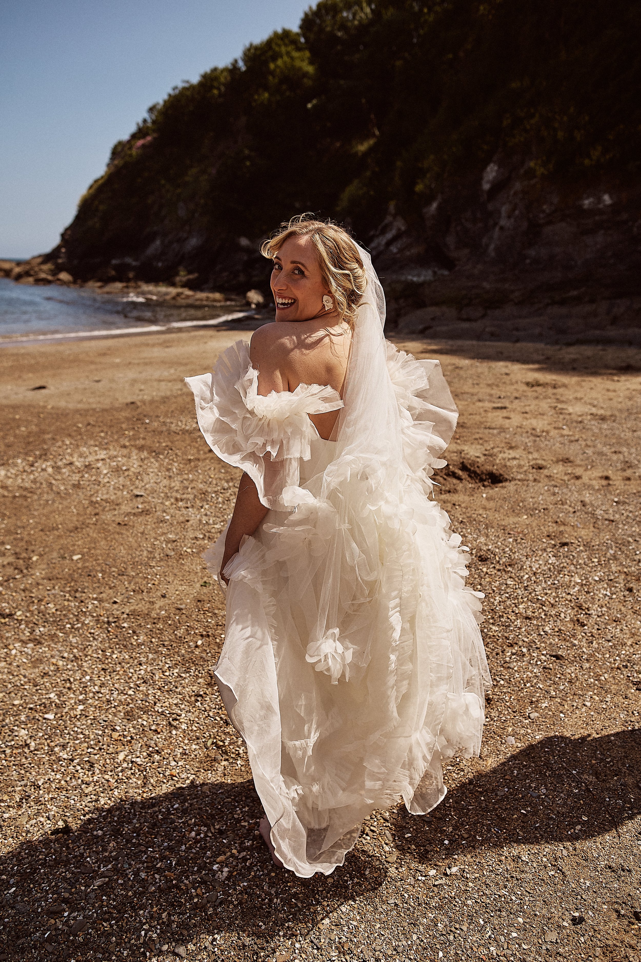 Beautiful bride Jess wears the Mayfair dress and Dandelion veil | Wedding dresses by Halfpenny London