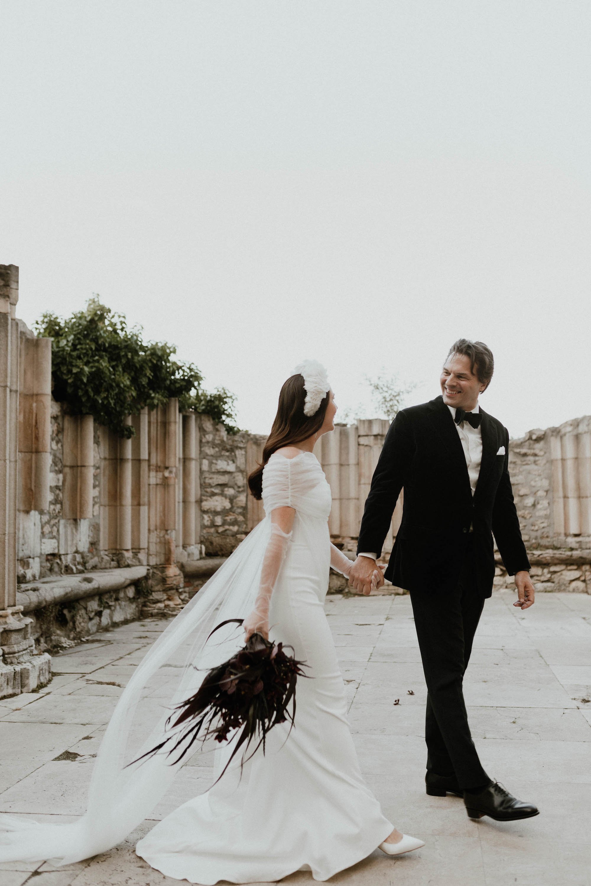 Beautiful bride Zsuzsa wore the Oliver Dress, Manet cape and Ariel bow | Wedding dress by Halfpenny London