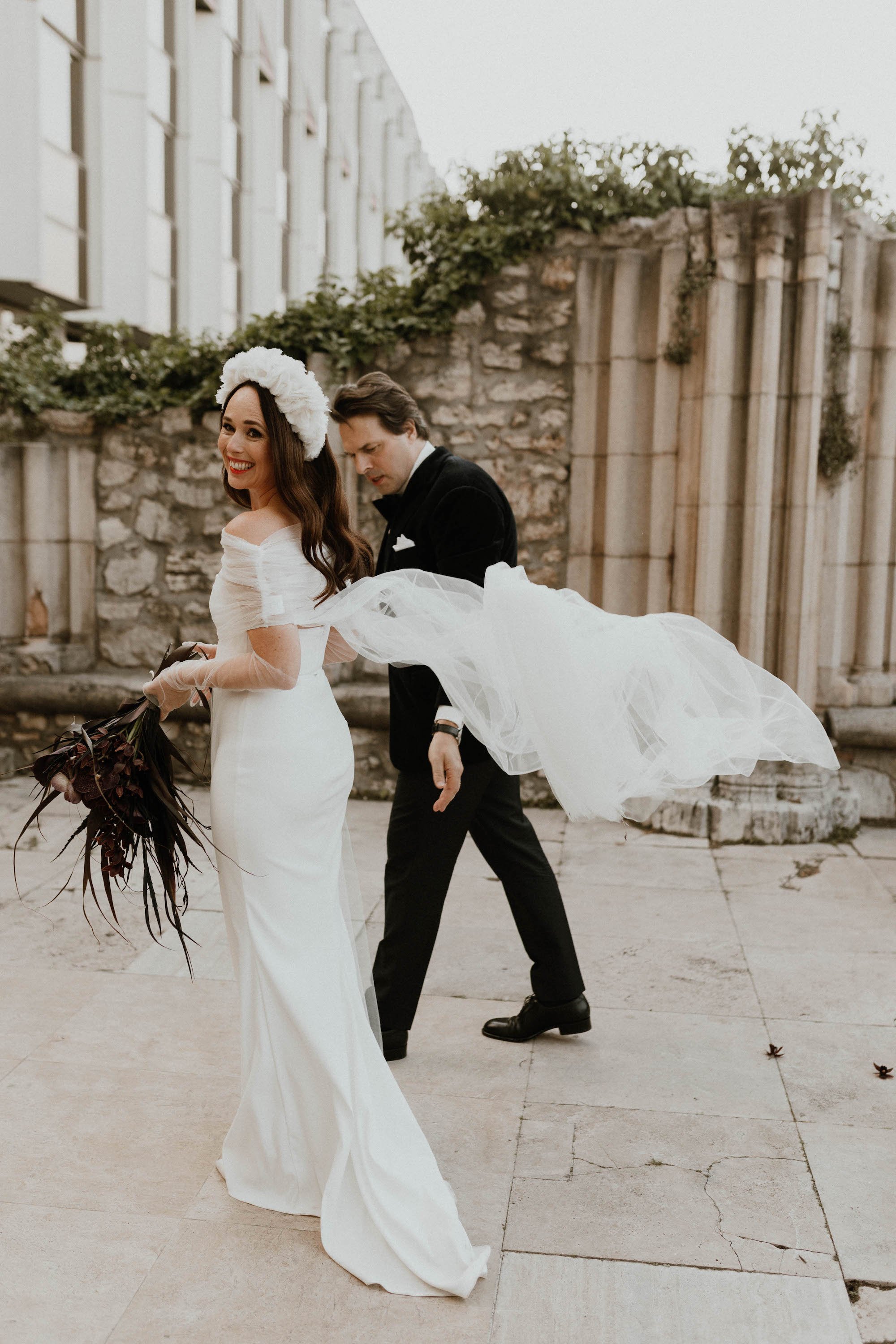 Beautiful bride Zsuzsa wore the Oliver Dress, Manet cape and Ariel bow | Wedding dress by Halfpenny London