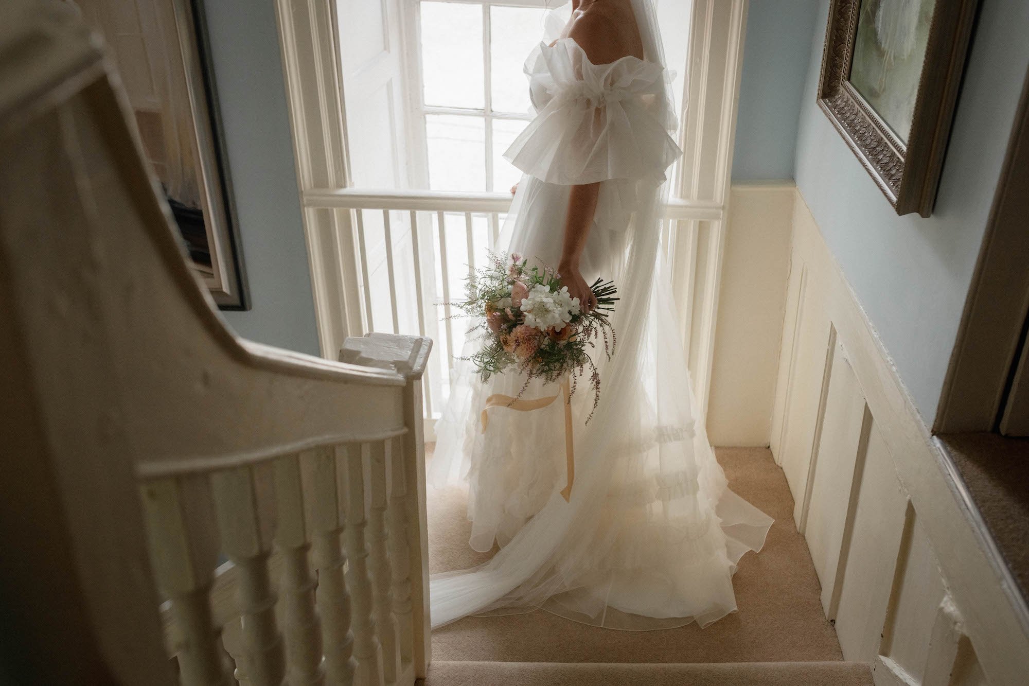 Beautiful bride Charlotte wore the Dayton dress, Mayfair skirt and Issa shrug | Wedding dress by Halfpenny London