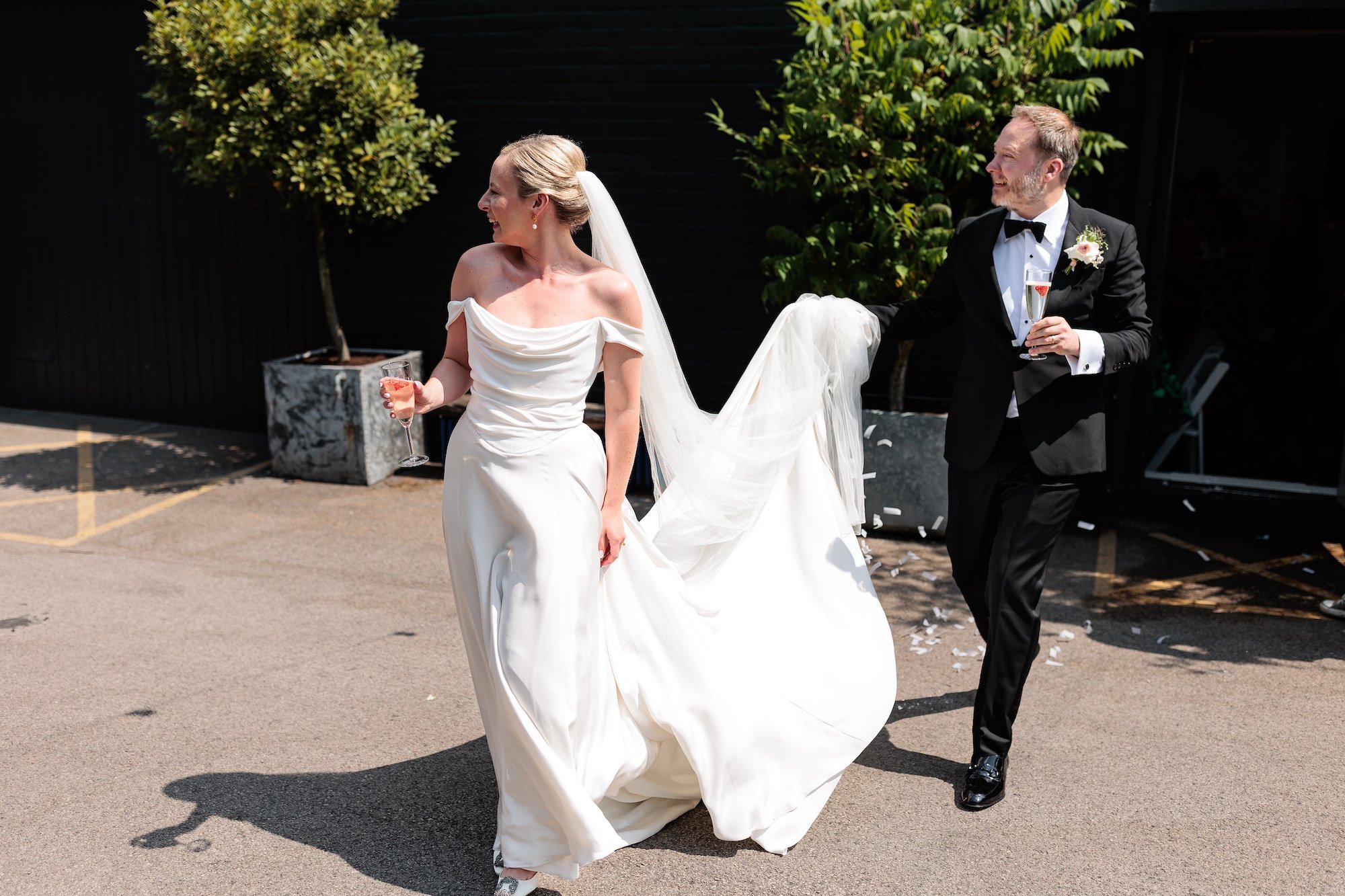 Beautiful bride Liz wears the silk Charlotte dress in Ivory | Wedding dresses by Halfpenny London 
