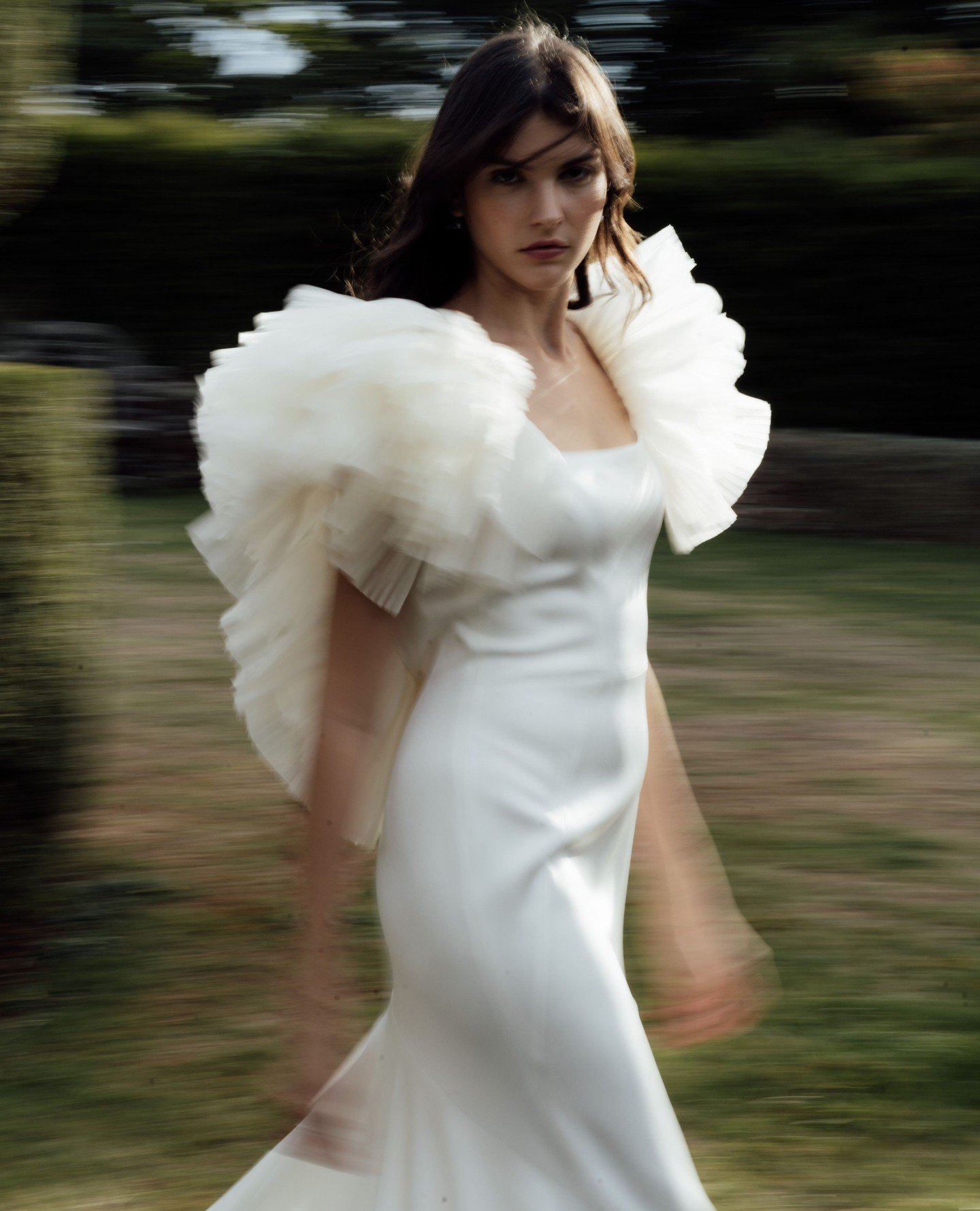 The Rae dress features voluminous pleated silk organza shoulders that float with every movement, paired with a plunging low back for an unforgettable finish.⁠
⁠
A study in contrast - delicate yet daring. If that sounds like you, the Rae gown might ju