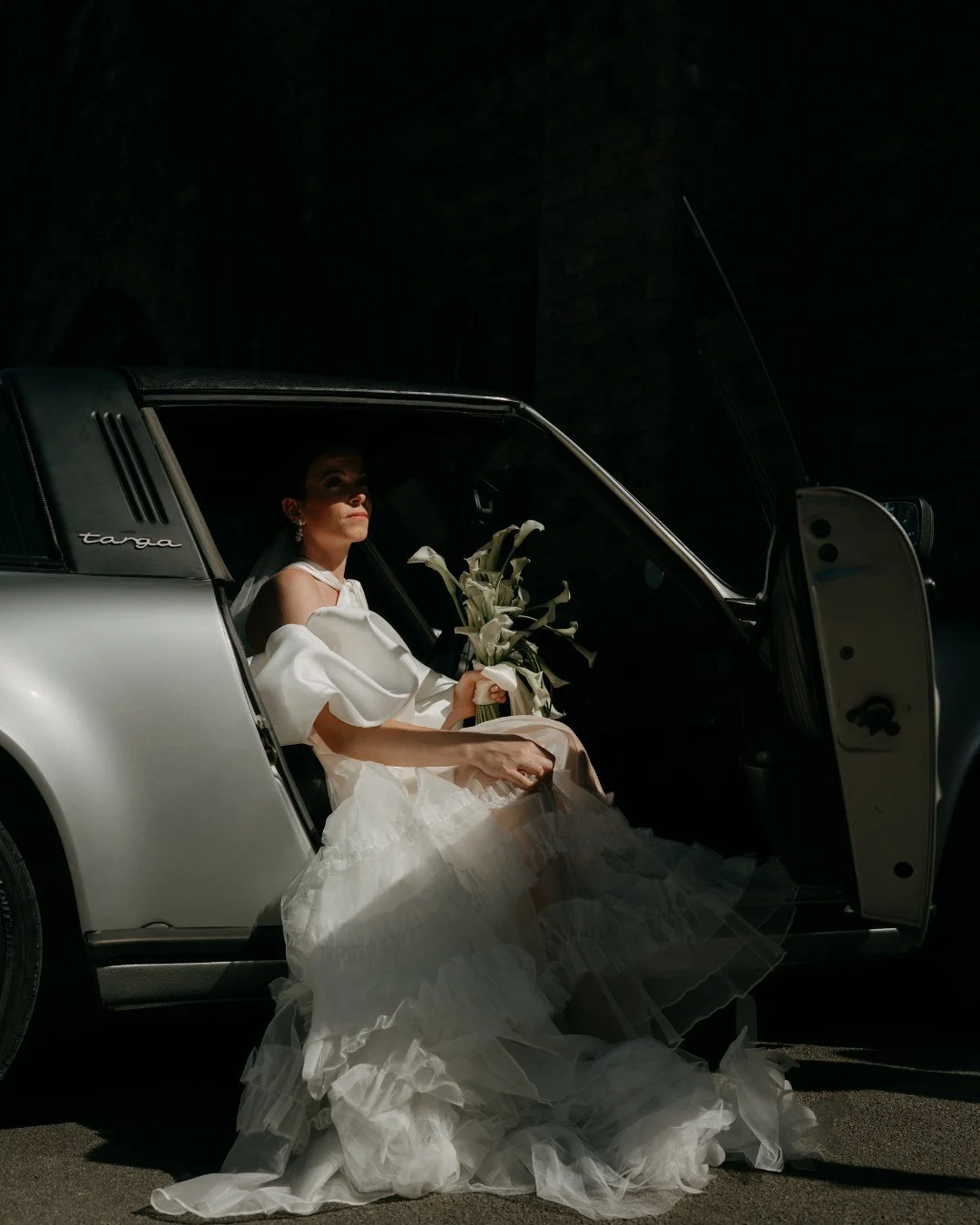 "The dress was truly the gown of my dreams - beautifully crafted, perfectly fitted, and even more stunning than I had imagined."⁠
⁠
@zoeszecel chose the Cheryl dress layered with the Mayfair skirt, finished with Sun sleeves and the Dandelio