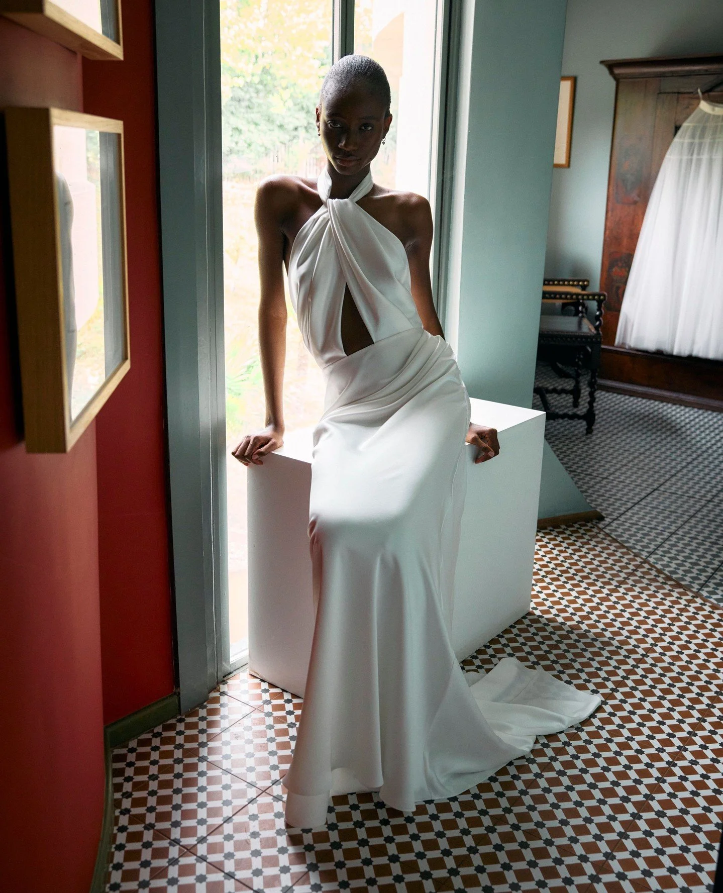 Sleek, fluid, and quietly striking.⁠
⁠
The Izy dress is a halterneck, bias-cut silhouette with a twisted drape front and signature low-back ties, designed for effortless movement, modern femininity.⁠
⁠
Discover the Twenty Vol.II collection in our Lon