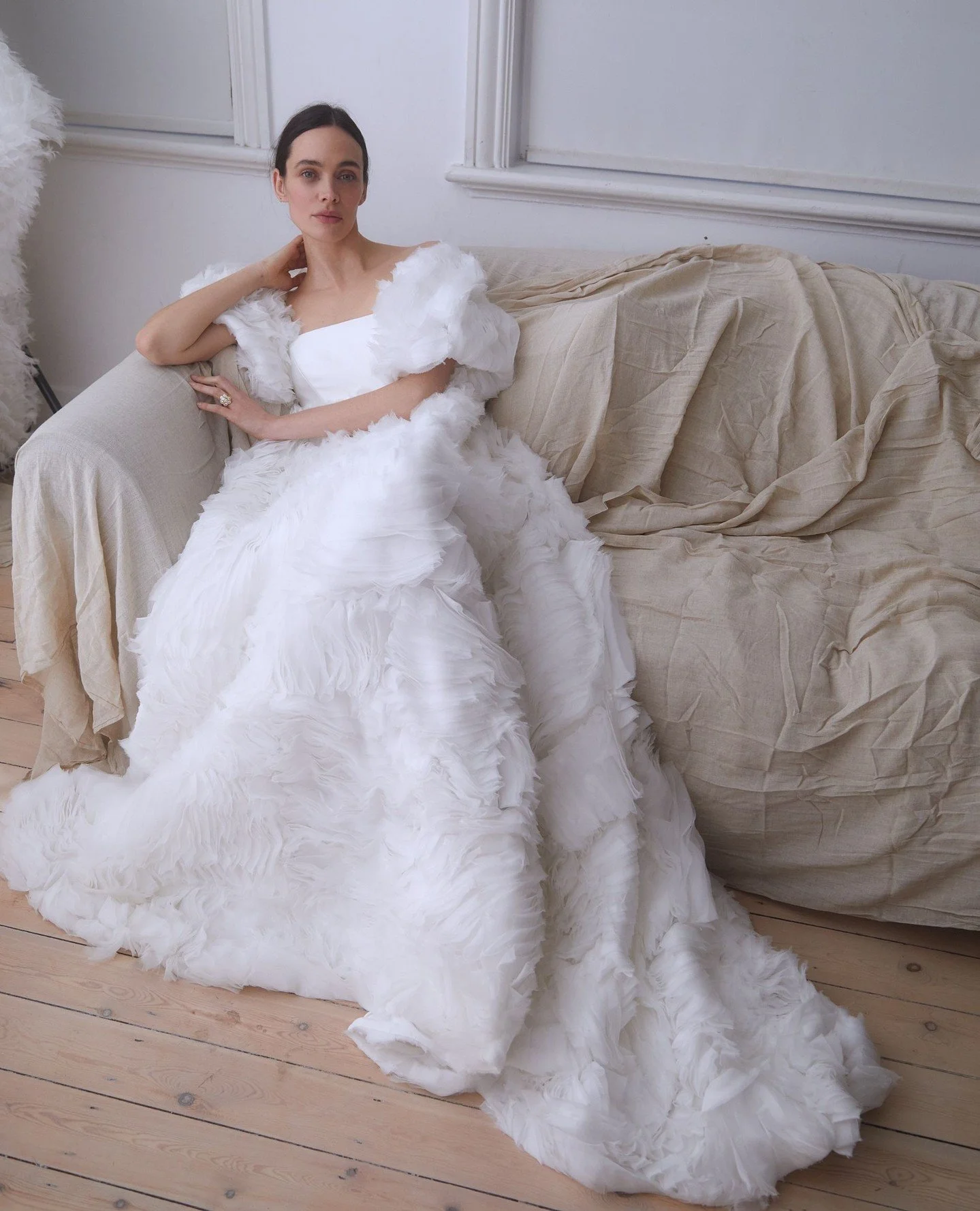 The Cecilie dress pairs mikado with textured rose-bloom organza, celebrating Halfpenny London&rsquo;s love of fabric, form and craftsmanship.⁠
⁠
An empire bodice flows into an undulating full skirt, while detachable organza sleeves can be worn on or 