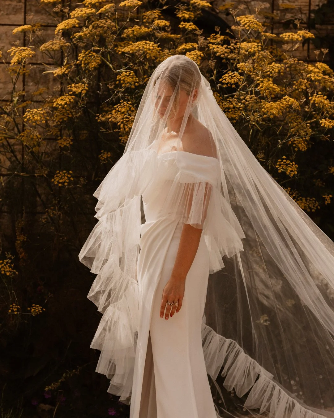 &ldquo;The first time I tried it on, it just felt right.&rdquo;⁠
⁠
Drawn to the Okotan corset&rsquo;s draped front and breathable fit, @vicky.longstaff paired it with the Okotan skirt and finished the look with the Margaret veil for her summer weddin