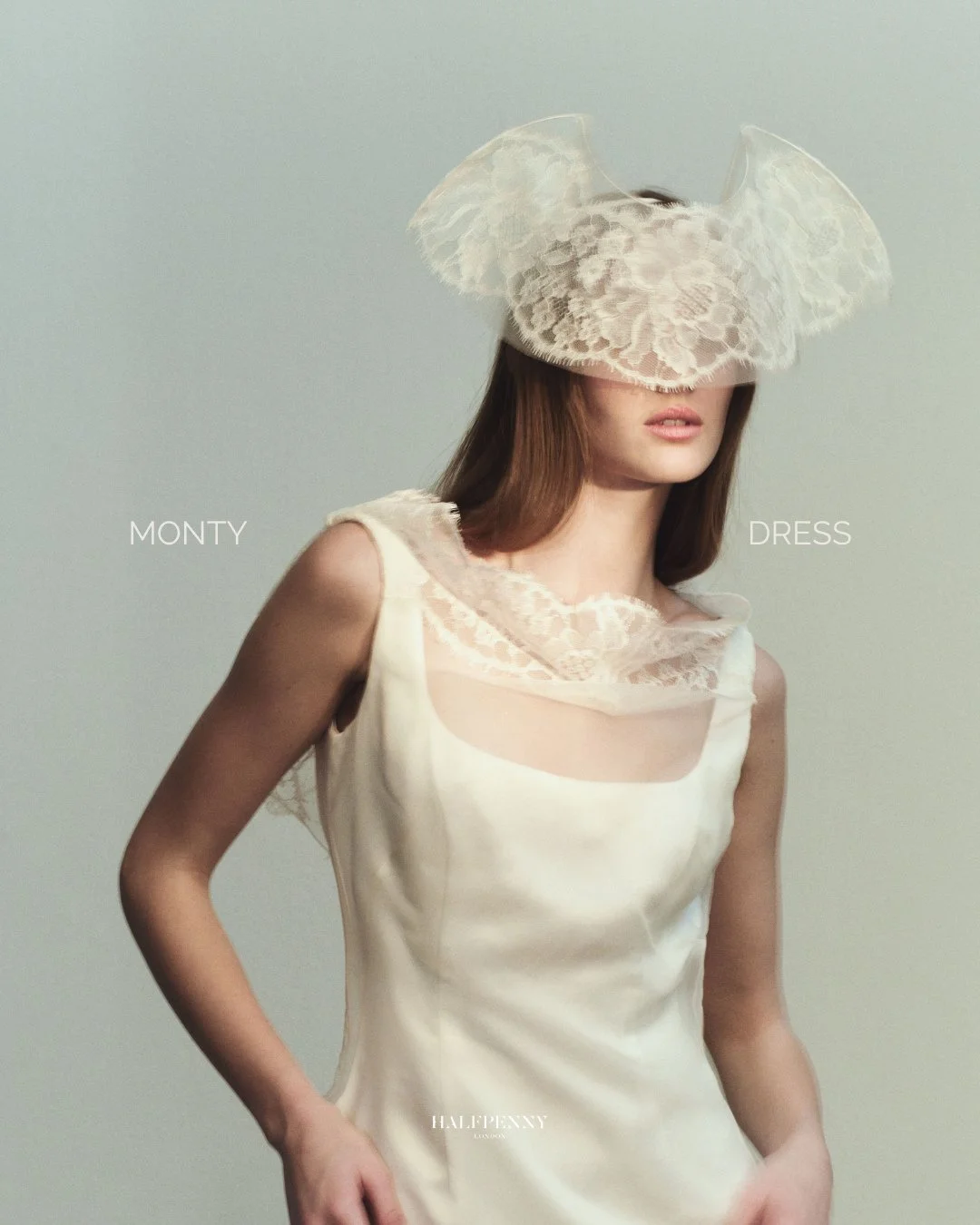 The Monty dress.⁠
⁠
A sheer organza overlay folds into an open back, revealing a liquid satin underdress that skims the body with a soft fit-and-flare silhouette. Understated, with quiet impact.⁠
⁠
Book your appointment.