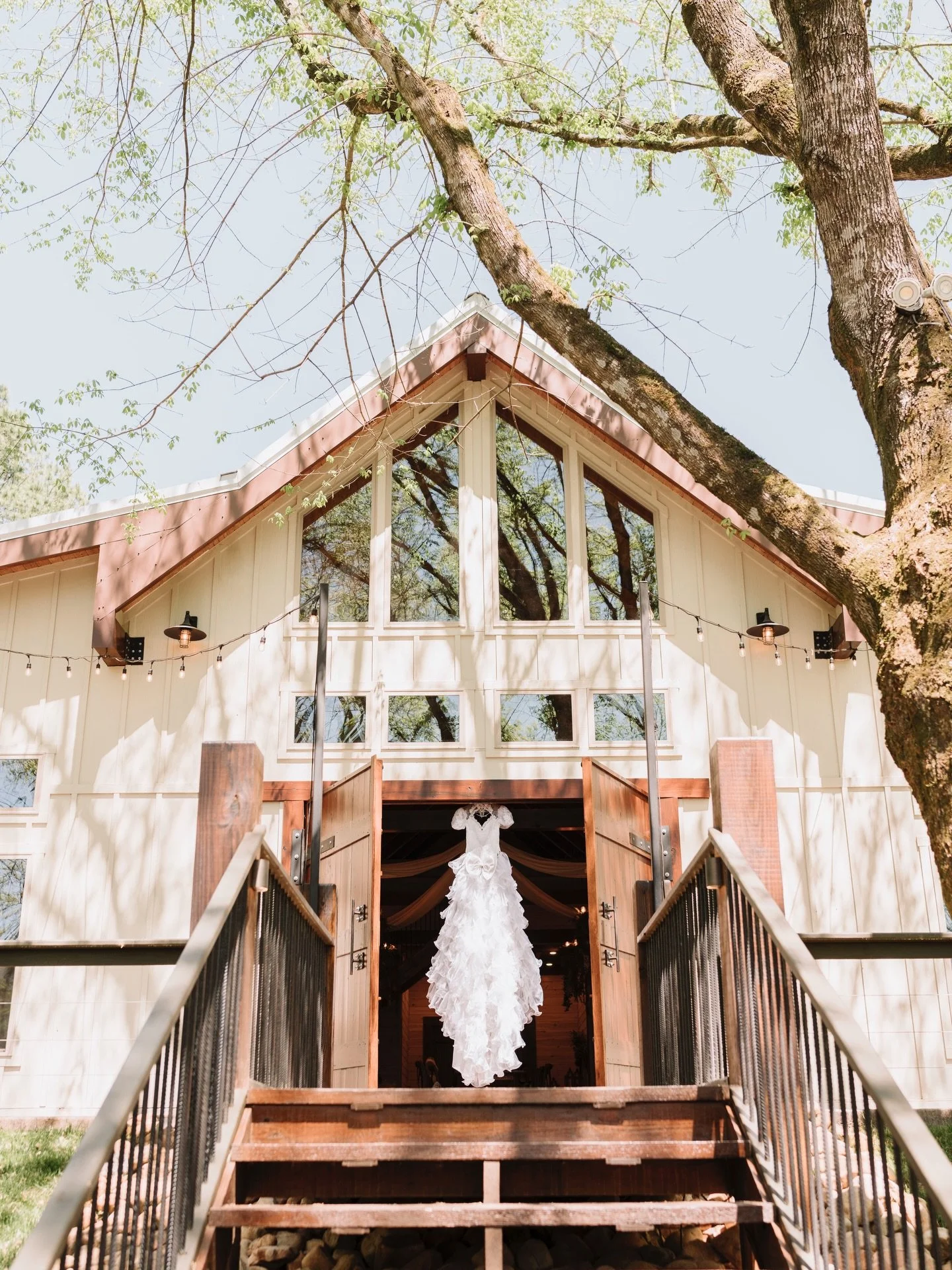 Some moments feel like they belong in a fairytale. ✨

A quiet morning, sunlight filtering through the trees, and the dress waiting patiently for its bride. Moments like this are why I love what I do &mdash; capturing the calm before the celebration, 