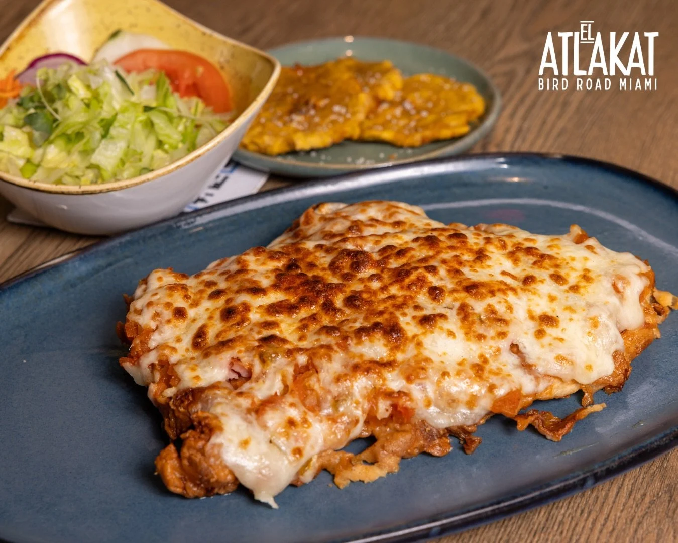 Golden, crispy milanesa topped with melted cheese&hellip; say no more. 🤤✨ Only at El Atlakat Bird Road 🇸🇻

ONLY AT BIRD ROAD: 9425 S.W. 40th. Street. Miami, FL 33165&nbsp;
💻 Orders, delivery and reservations at www.elatlakat.com
☎️ (305-552-9090)