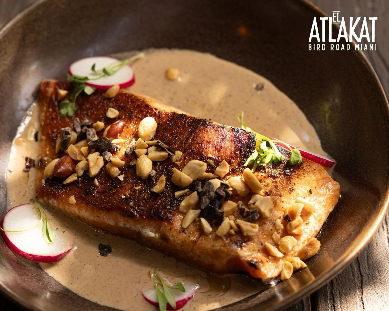 Big flavor energy on the plate. Salm&oacute;n al Morro, done our way. 😏🍽️

ONLY AT BIRD ROAD: 9425 S.W. 40th. Street. Miami, FL 33165&nbsp;
💻 Orders, delivery and reservations at www.elatlakat.com
☎️ (305-552-9090) or ☎️ (305-552-1918)
&nbsp;
#Mia