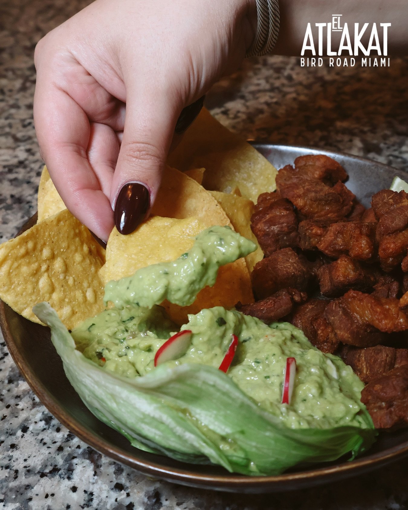 Crunchy chicharr&oacute;n, creamy guacamole, and good company. 🐷🥑 This is how Salvadoran cravings are meant to be shared 🇸🇻✨

ONLY AT BIRD ROAD: 9425 S.W. 40th. Street. Miami, FL 33165&nbsp;
💻 Orders, delivery and reservations at www.elatlakat.c