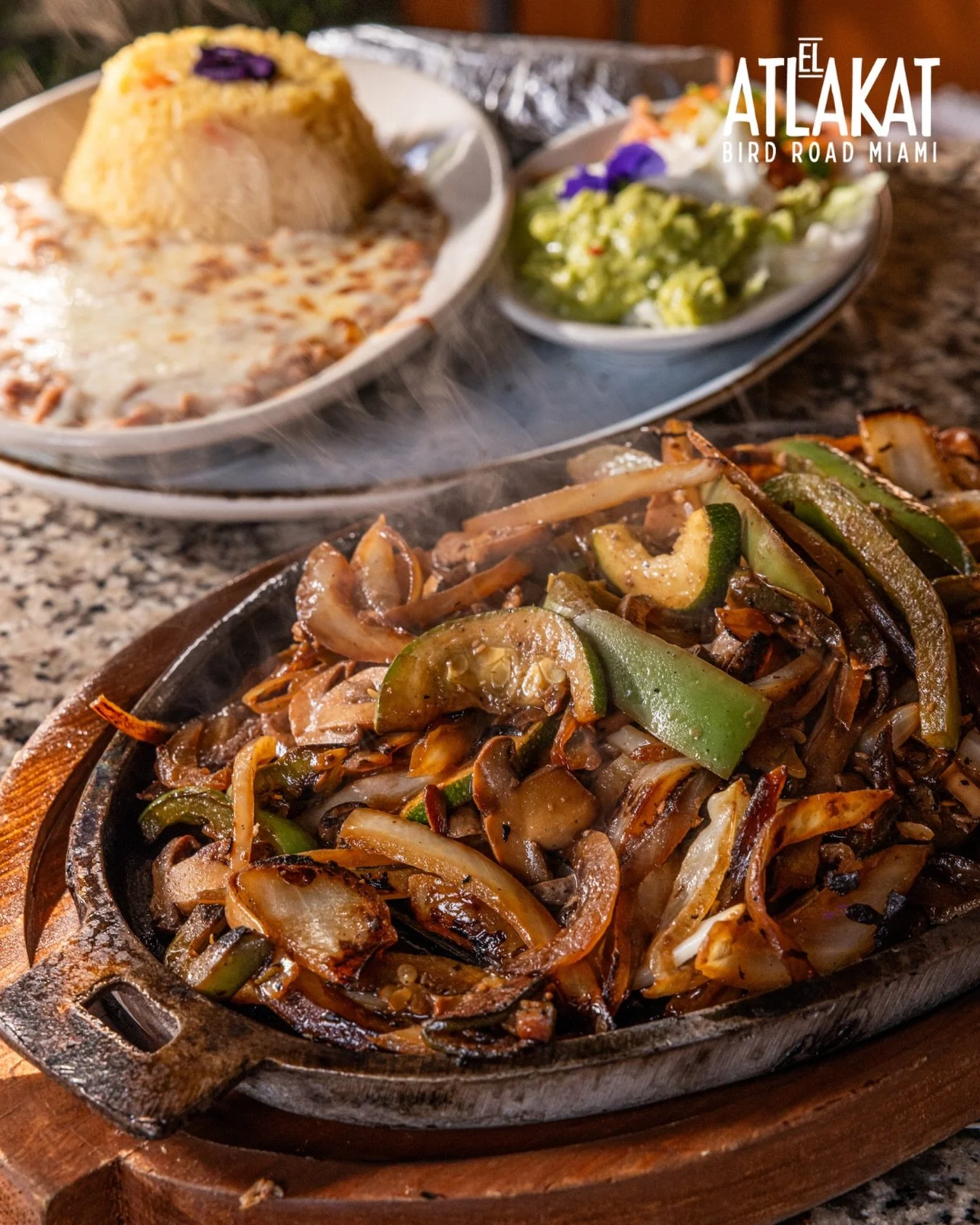 That sizzle. That smoke. That smell. Our fajitas arrive loud and leave you wanting more. 🫓🇸🇻

ONLY AT BIRD ROAD: 9425 S.W. 40th. Street. Miami, FL 33165&nbsp;
💻 Orders, delivery and reservations at www.elatlakat.com
☎️ (305-552-9090) or ☎️ (305-5