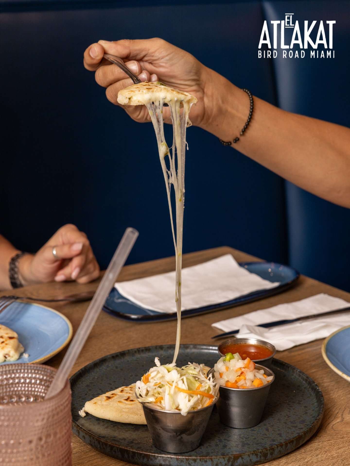 That pull though. 🧀🔥 Handmade pupusas stuffed with melty cheese &mdash; need we say more? 🇸🇻✨

ONLY AT BIRD ROAD: 9425 S.W. 40th. Street. Miami, FL 33165&nbsp;
💻 Orders, delivery and reservations at www.elatlakat.com
☎️ (305-552-9090) or ☎️ (305