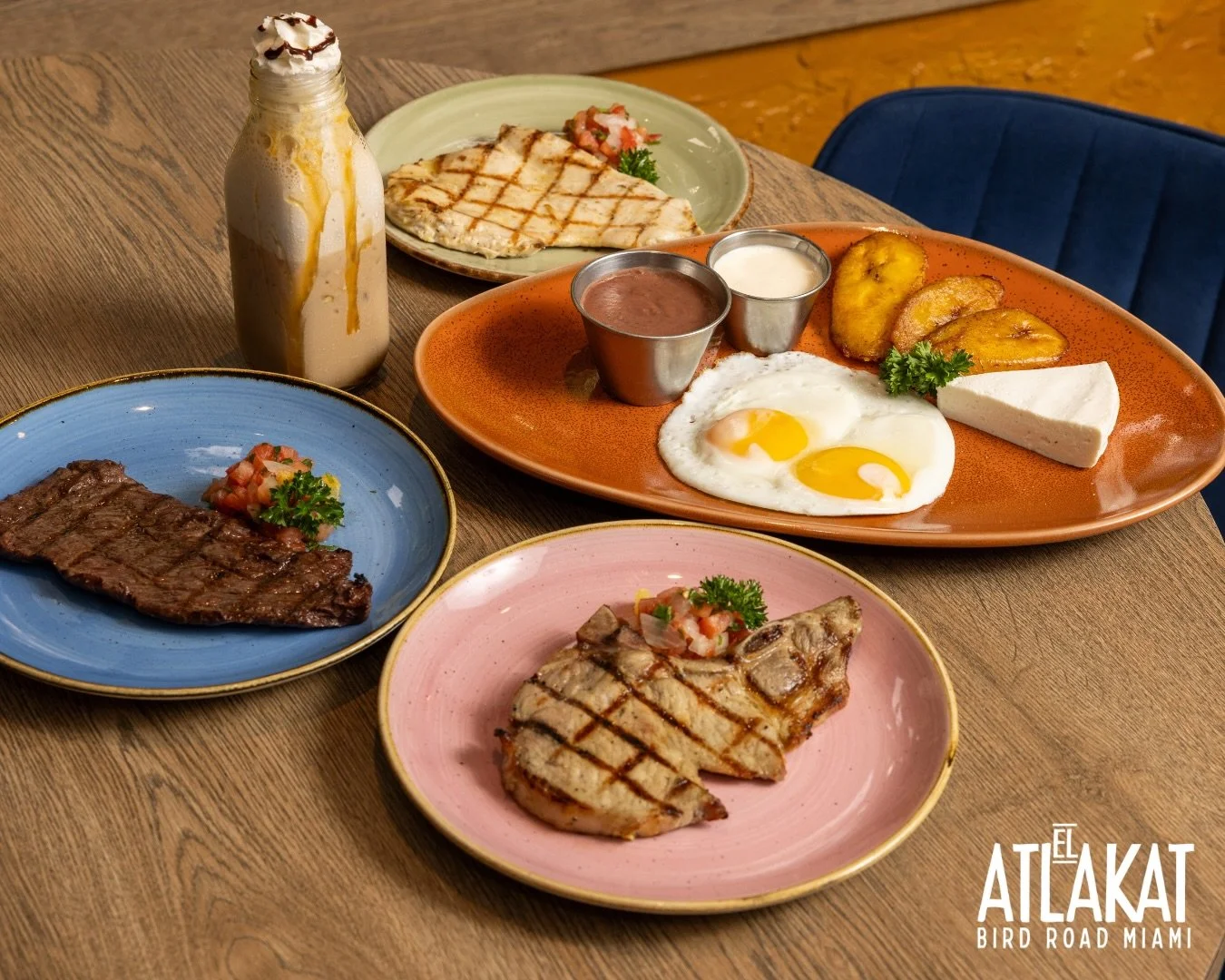 Eggs, steak, pork chop, sweet plantains, beans, cream and a cold coffee. This is Desayuno Ancestral done the Salvadoran way. 🇸🇻🔥

ONLY AT BIRD ROAD: 9425 S.W. 40th. Street. Miami, FL 33165&nbsp;
💻 Orders, delivery and reservations at www.elatlaka