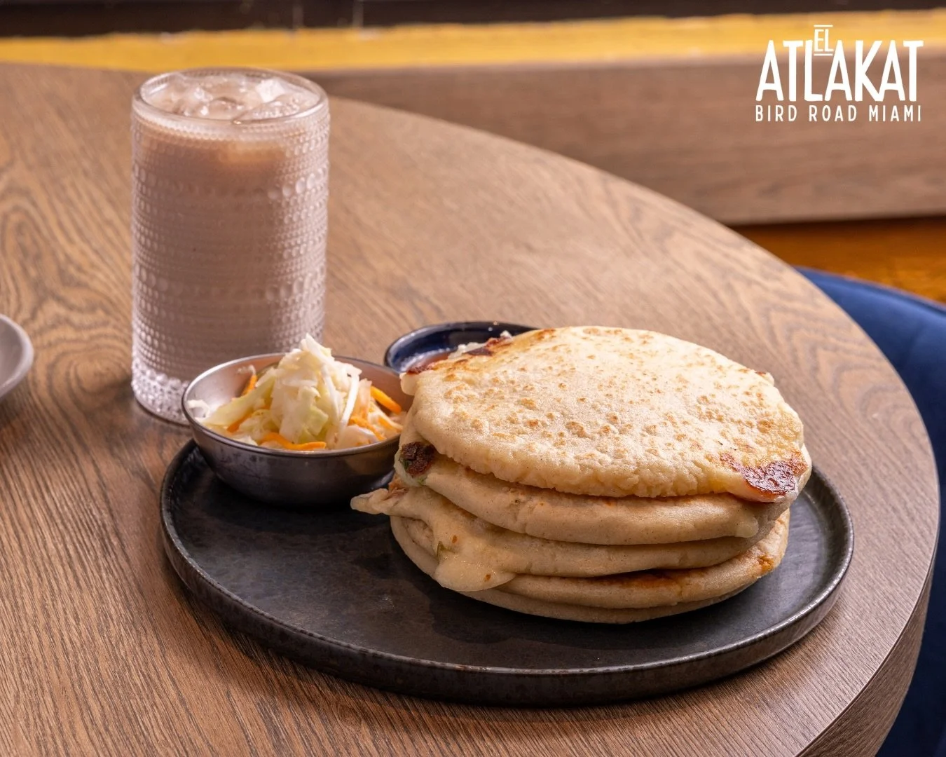 The ultimate Salvadoran combo 💛 Hot pupusas, melty cheese, and refreshing Horchata de Morro made the traditional way. 🥛🍃

ONLY AT BIRD ROAD: 9425 S.W. 40th. Street. Miami, FL 33165&nbsp;
💻 Orders, delivery and reservations at www.elatlakat.com
☎️