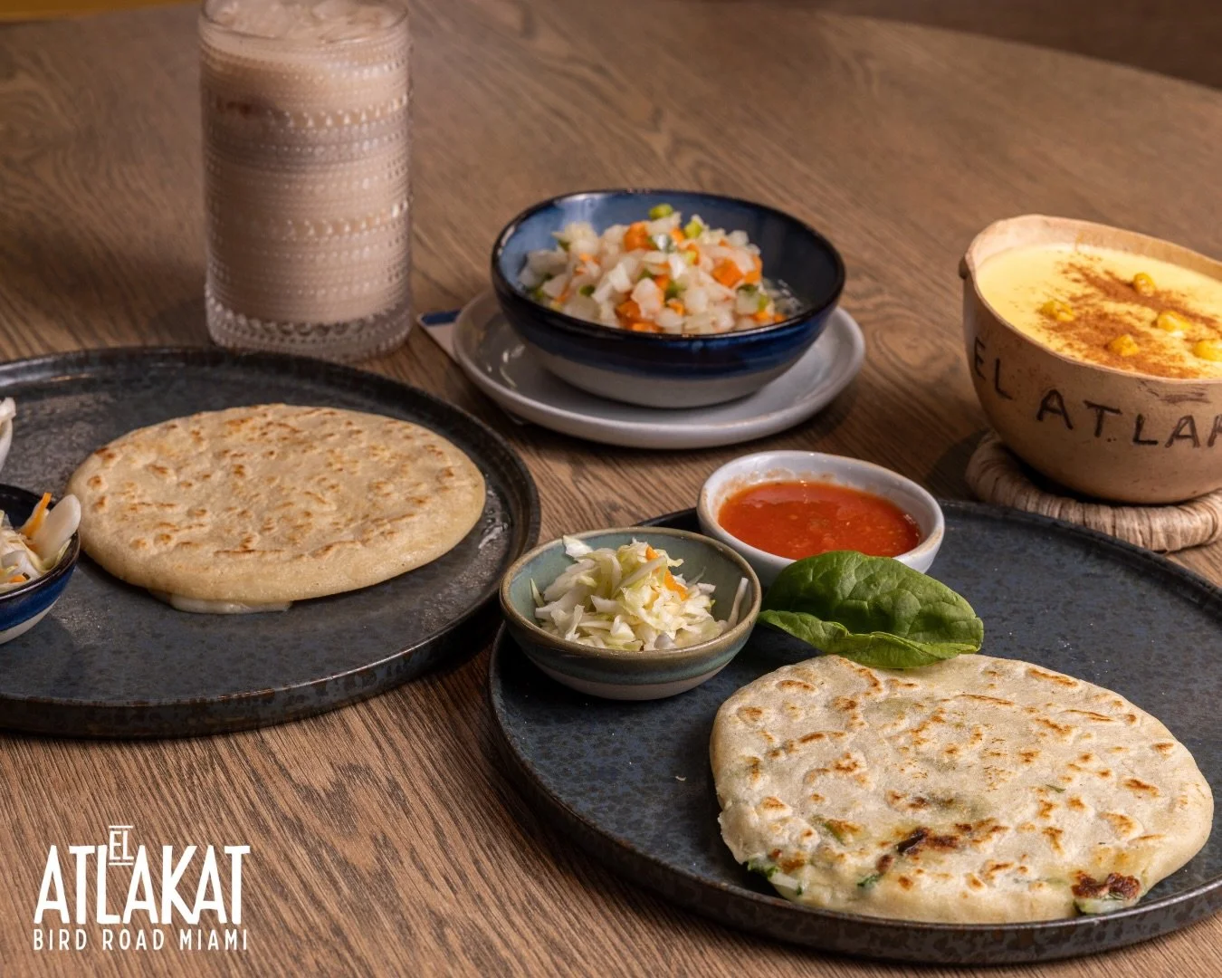 Breakfast the Salvadoran way ☀️🫓 Fresh pupusas, horchata, atol de elote and all the cozy morning vibes waiting for you at El Atlakat.

ONLY AT BIRD ROAD: 9425 S.W. 40th. Street. Miami, FL 33165&nbsp;
💻 Orders, delivery and reservations at www.elatl