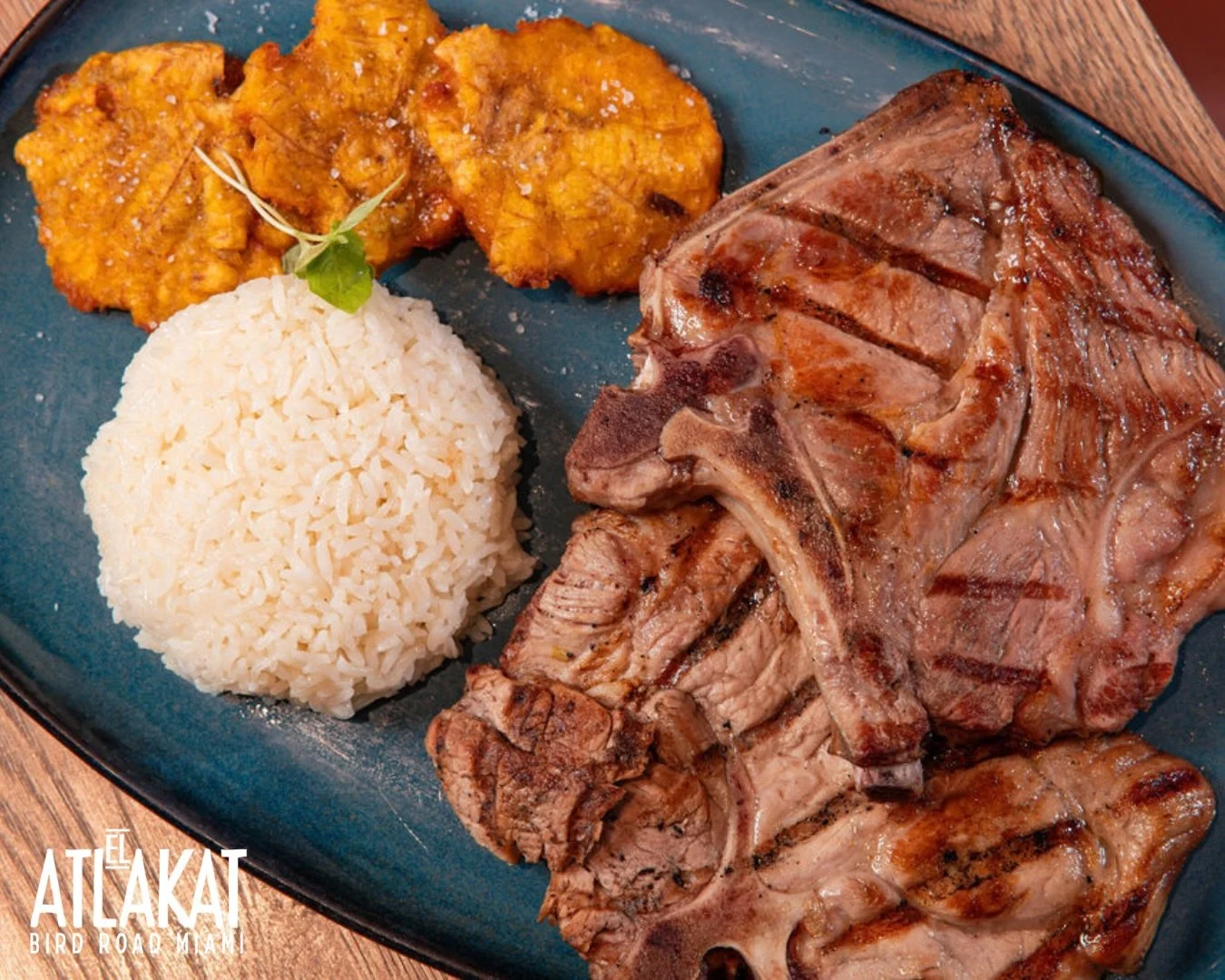 Juicy, tender, and grilled to perfection 🔥🥩 Pork Chop served with fluffy white rice and crispy golden plantains for the perfect Salvadoran comfort meal. 🇸🇻✨

ONLY AT BIRD ROAD: 9425 S.W. 40th. Street. Miami, FL 33165&nbsp;
💻 Orders, delivery and