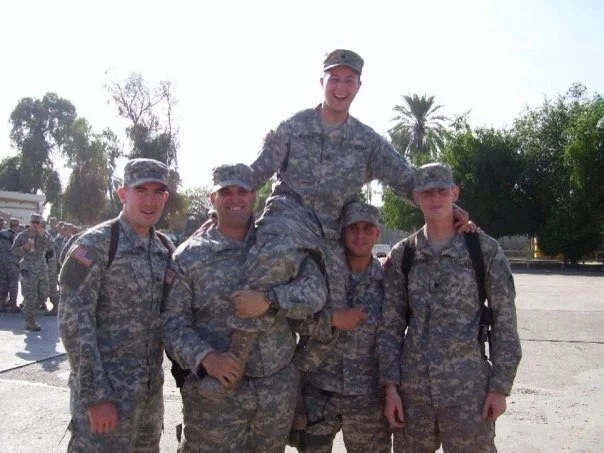 Number 13 Kevin with army buddies.jpg