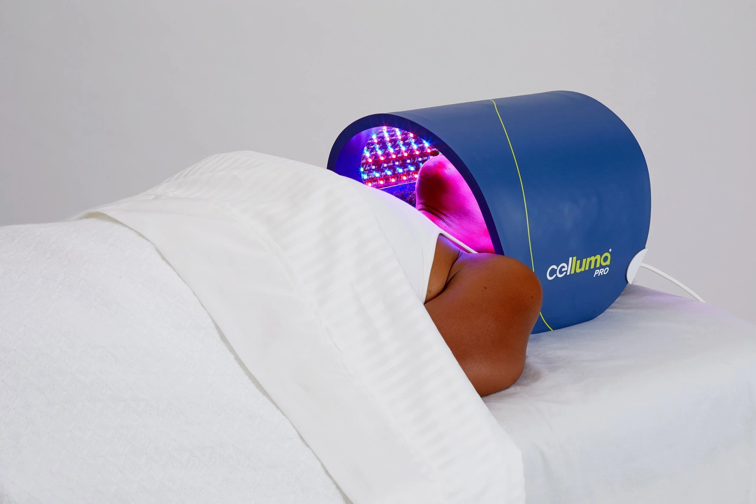 Client receiving Celluma LED red light therapy treatment