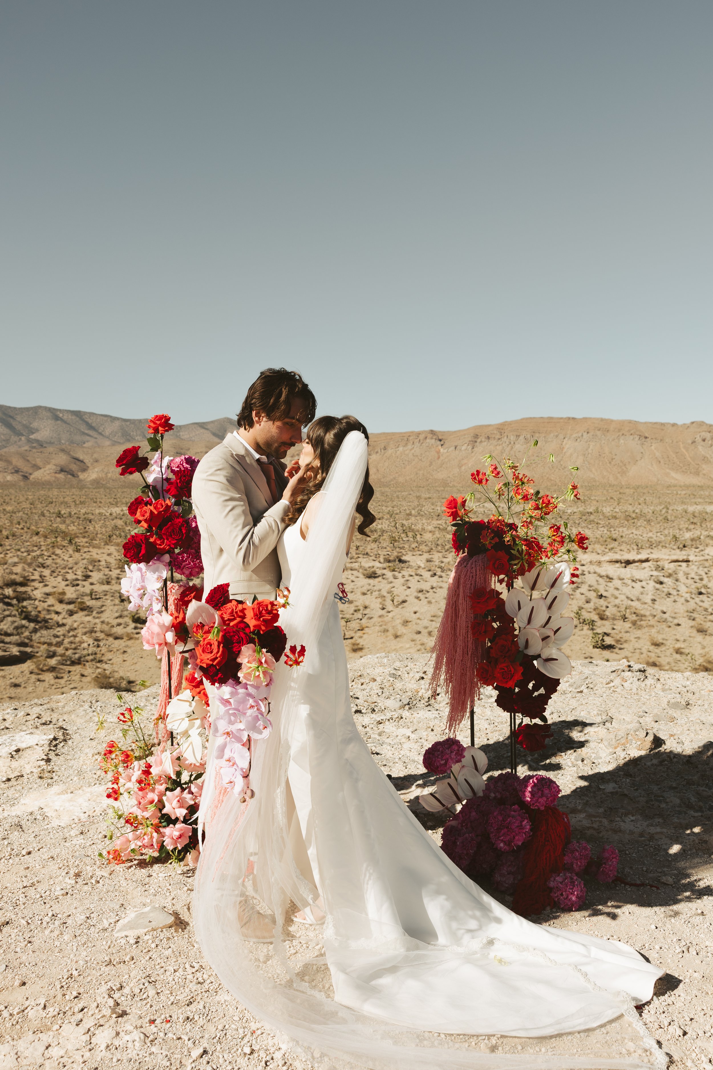 bride and groom couple wedding ceremony floral installation