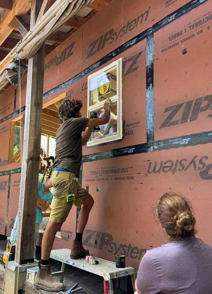 Ben showing us how to install a window