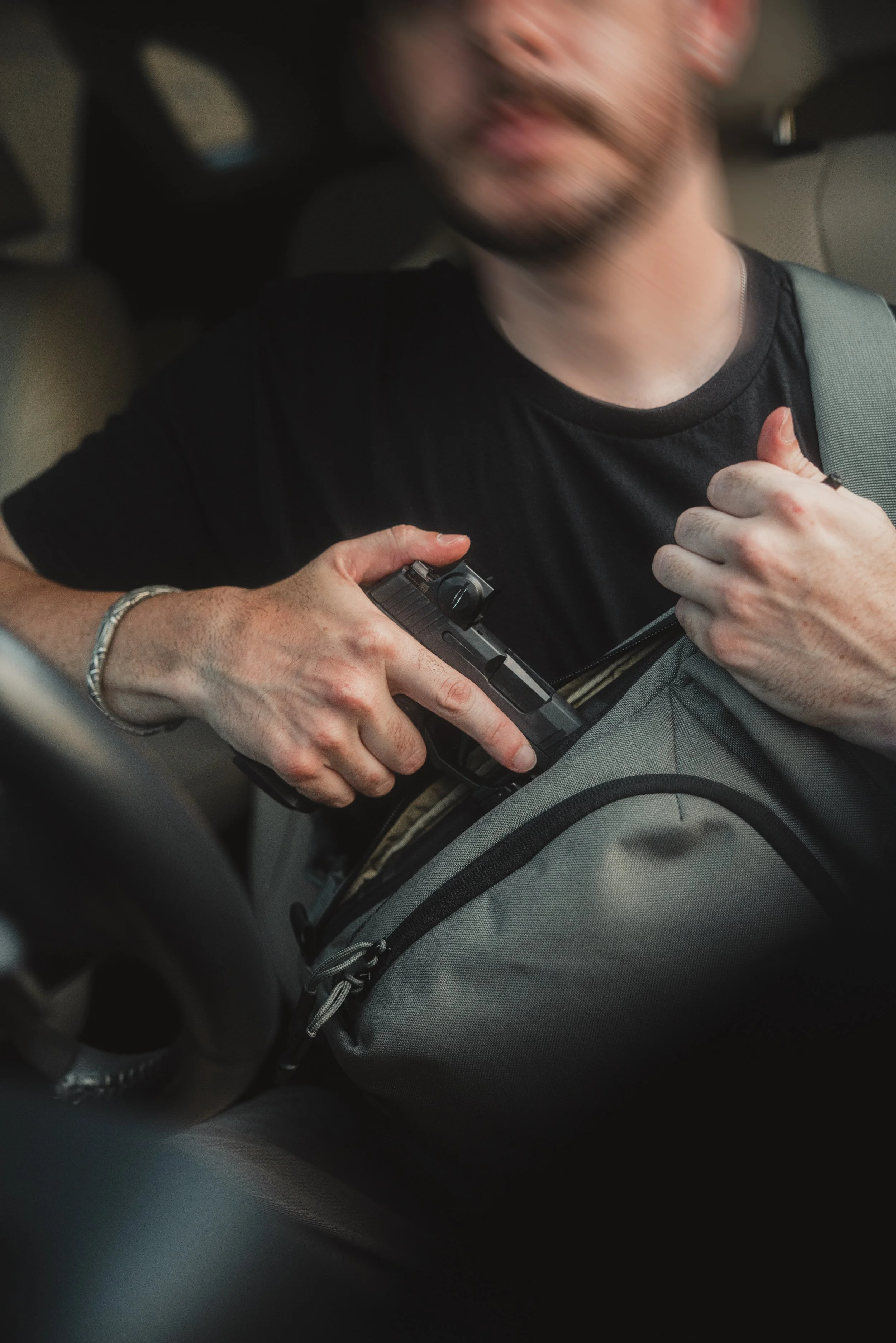 Sling Bag with Pistol_001.jpeg