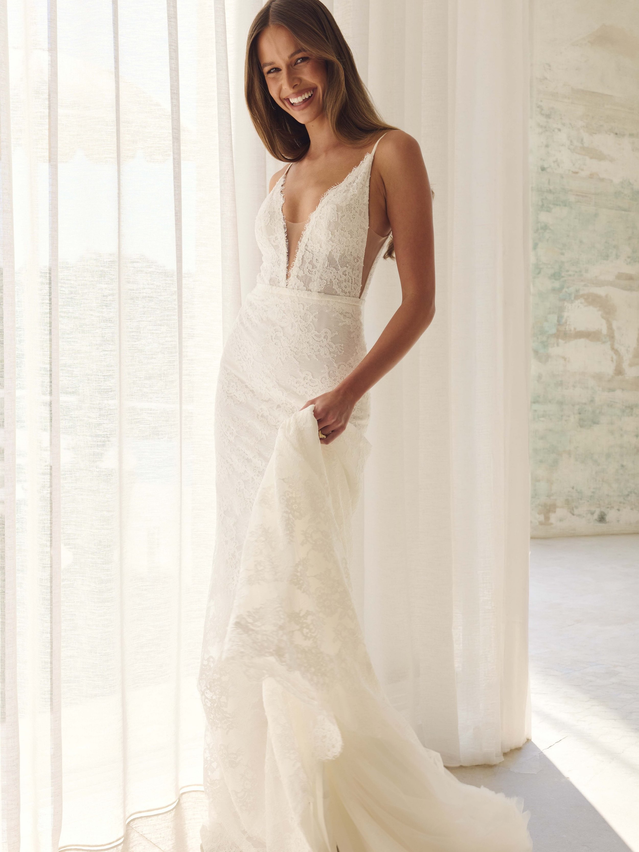 ZAK by MWL 

Zak features a flattering plunging neckline and a flattering back silhouette, crafted from romantic lace and soft tulle for a look that&rsquo;s both bold and delicate. 

The MWL classic feels like it&rsquo;s back with Zak and we are sooo