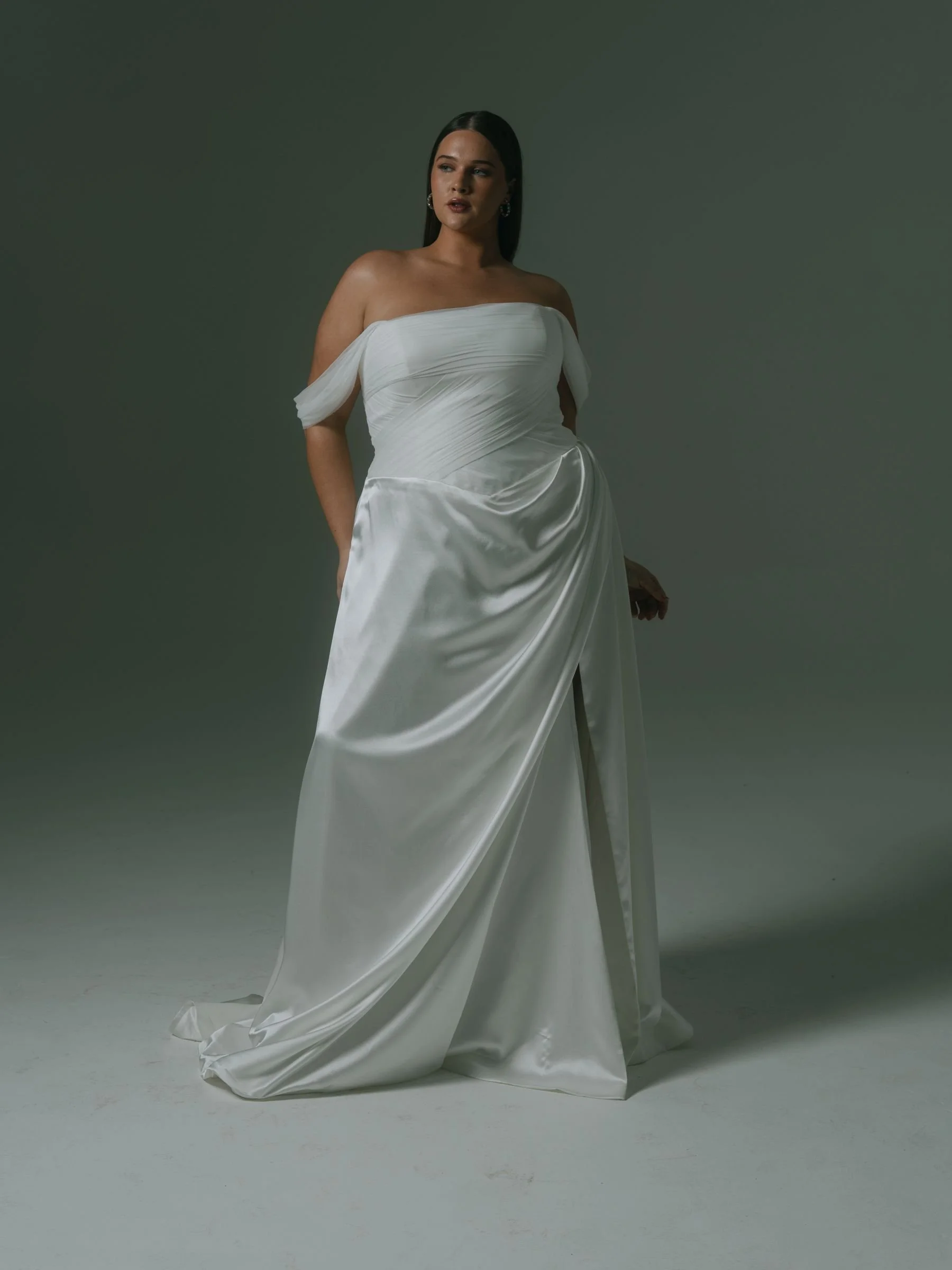 woman dressed in curve wedding dress