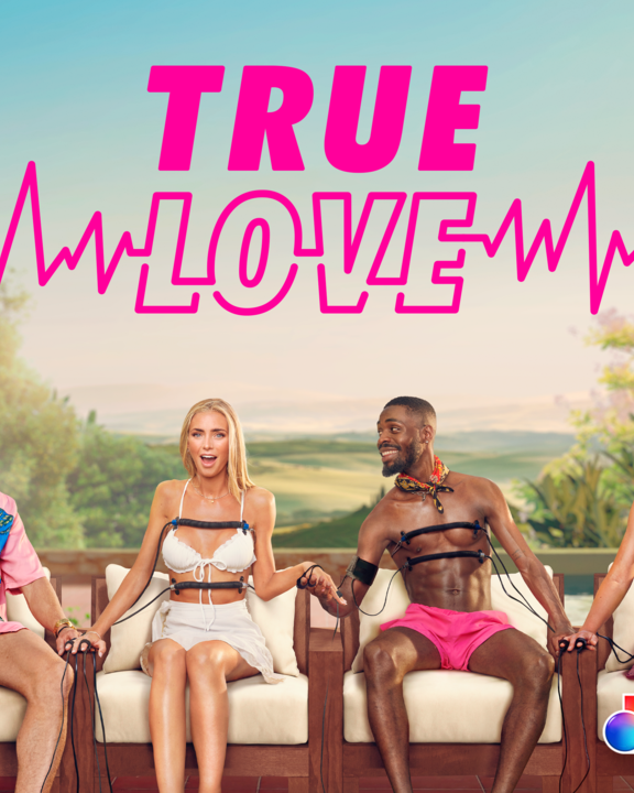 Six people sitting on a patio using virtual reality headsets held with hands linked together, with a title 'True Love' and the logo 'Discovery Original'.