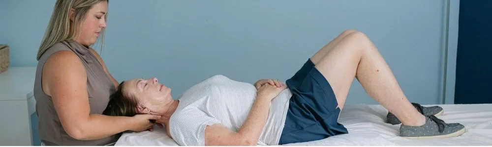 physical therapist treating menopausal woman