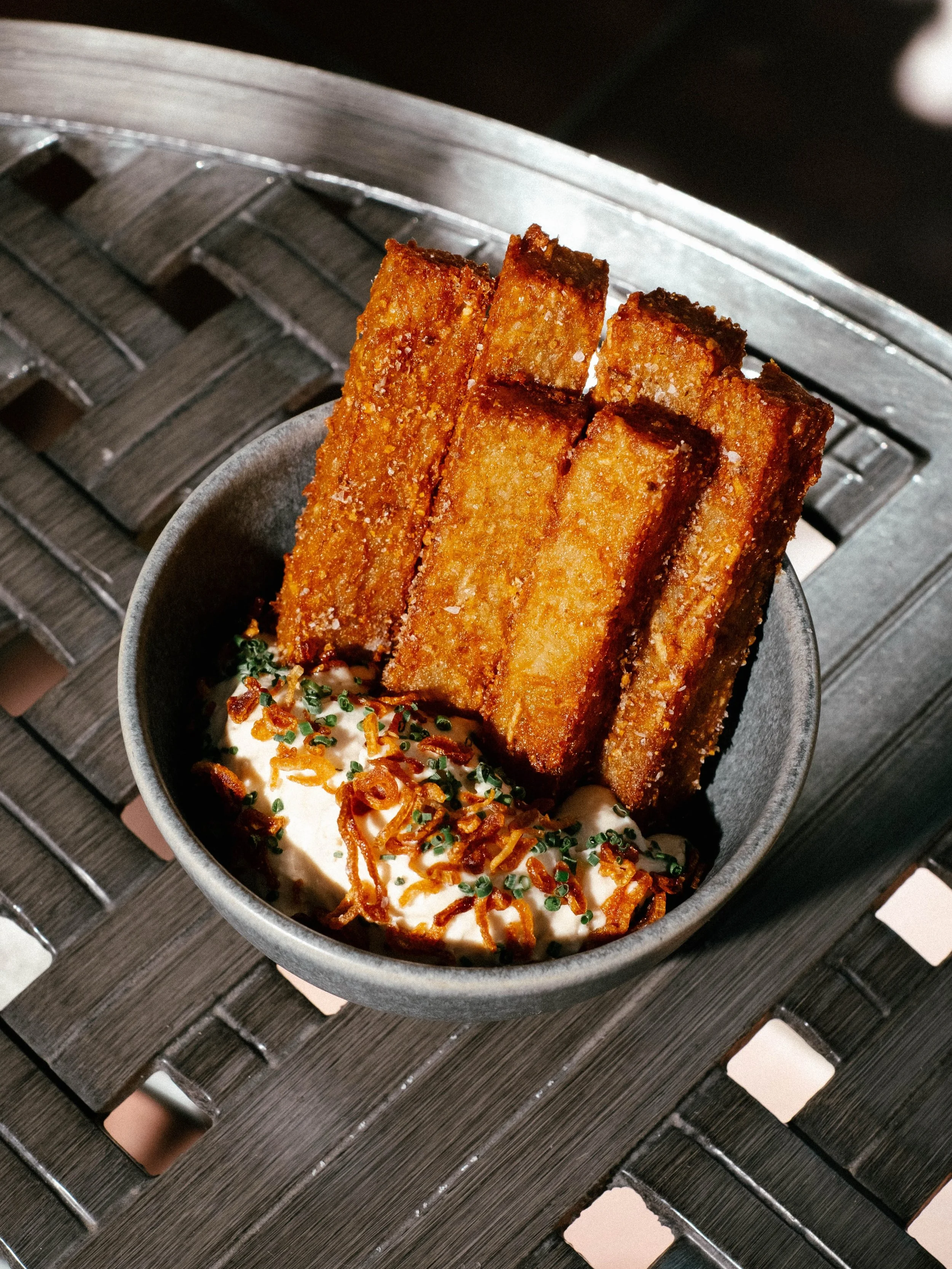 HASH BROWN LYONNAISE 
House-made beef fat hashbrown, french onion dip, crispy shallots, chives

A new star on our first course menu, available during Happy Hour &amp; dinner service at The Star Lounge.