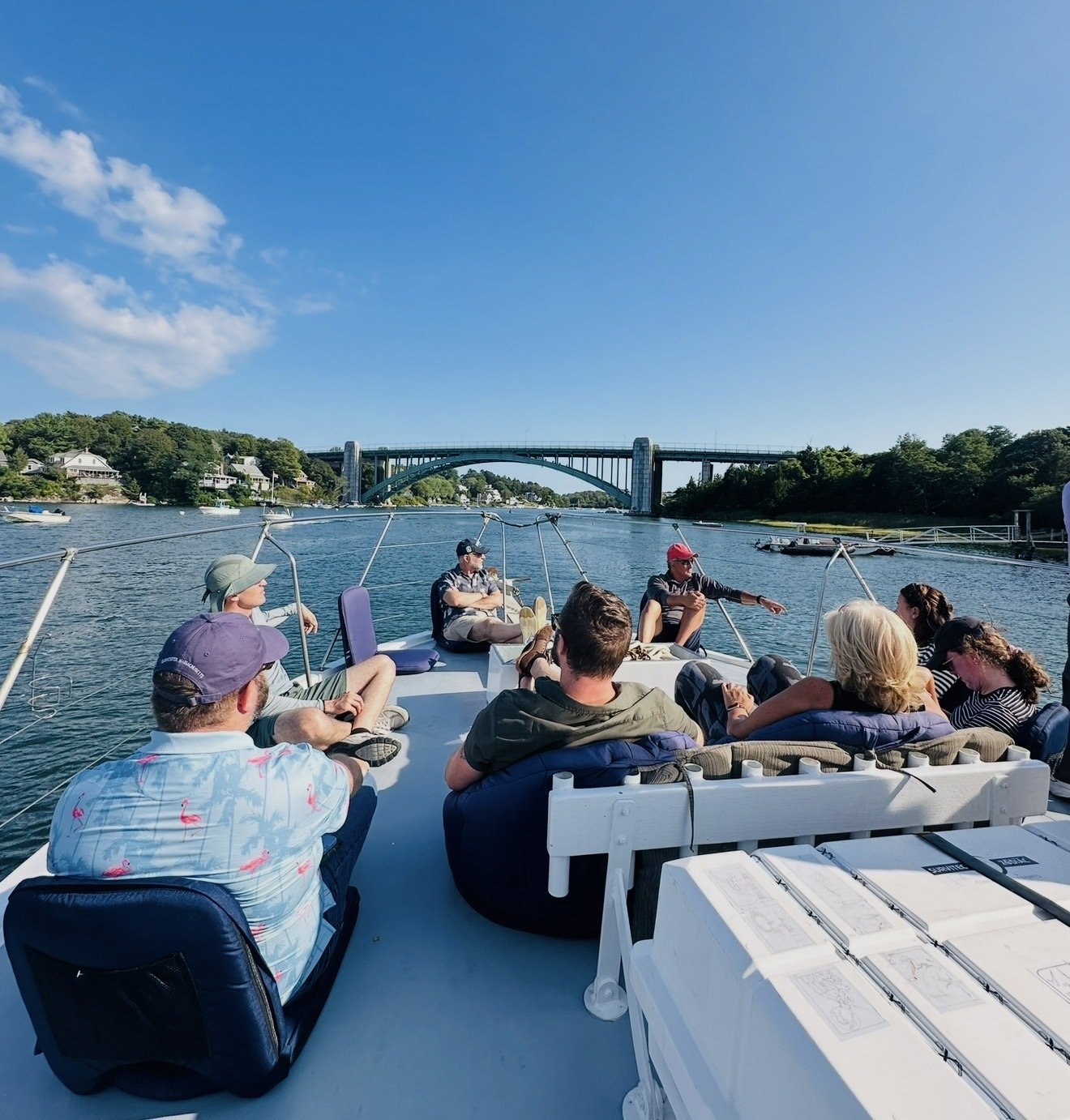 Glide through Gloucester’s scenic river route beneath the A. Piatt Andrew Bridge.