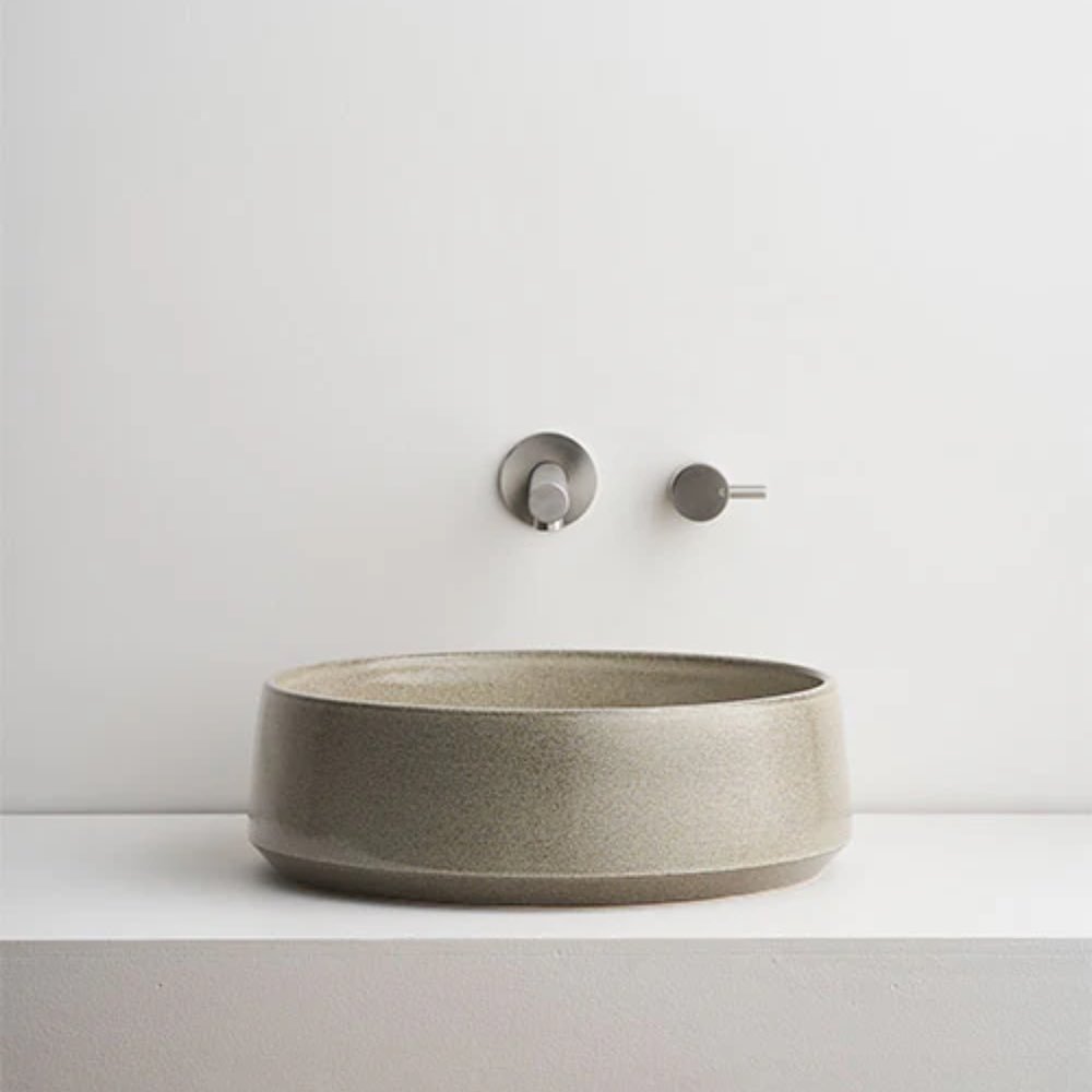 Elevate your bathroom with Robert Gordon Interiors&rsquo; handcrafted ceramic basins. Their above-counter basins bring any space to life through minimalist designs, interesting colours, and striking patterns. From the round basins in the compact Kiln