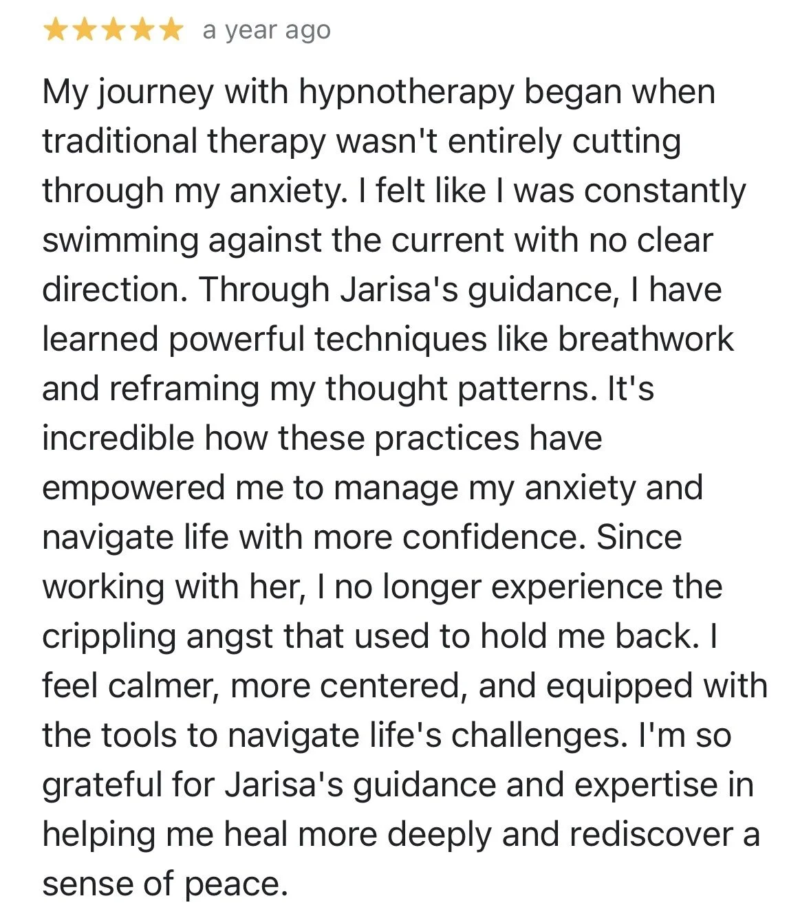 Customer review with five-star rating about hypnotherapy experience, describing overcoming anxiety and gaining confidence through techniques learned from Jarisa
