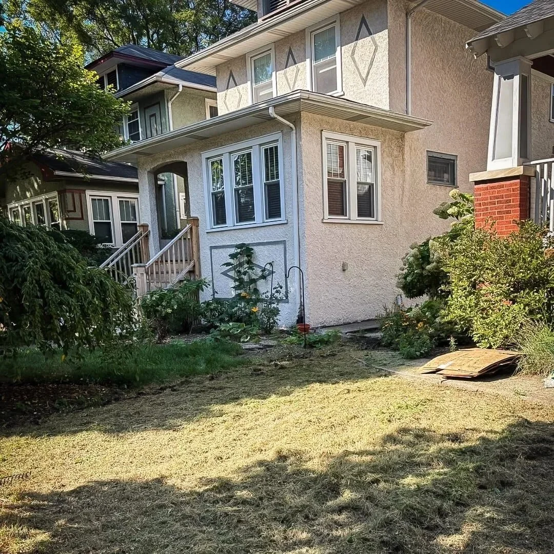Oak Park front yard with sparse lawn and minimal planting before native garden installation.