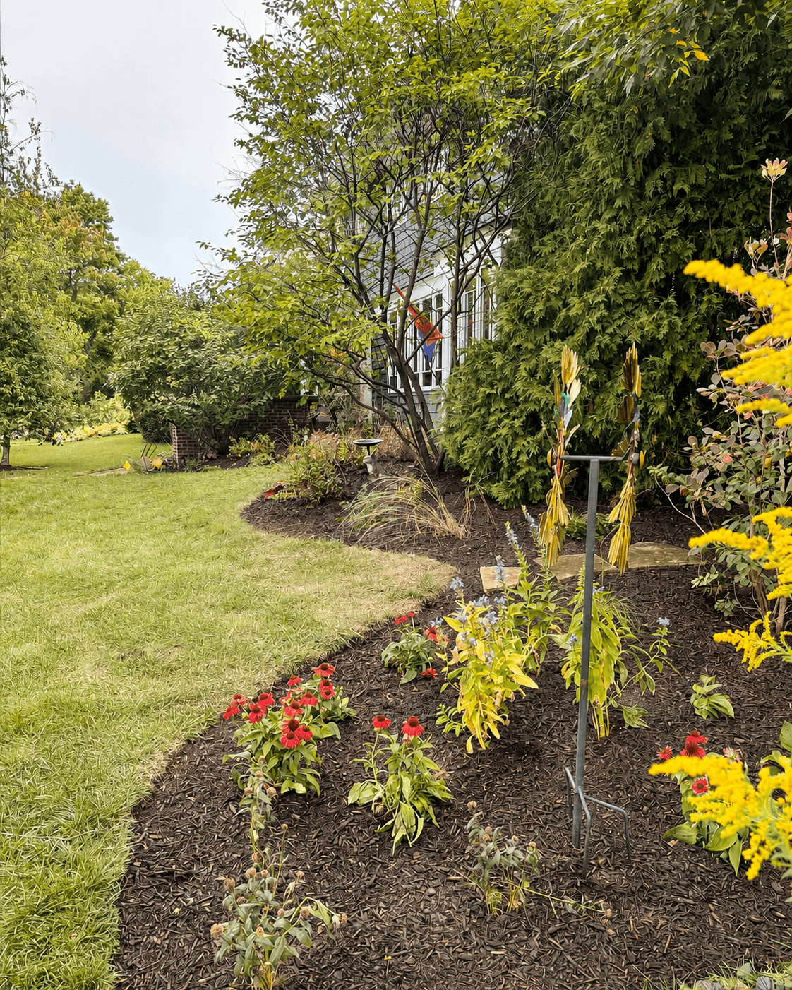 Still young, but already more intentional. This garden will keep filling in, changing, and getting better each season.