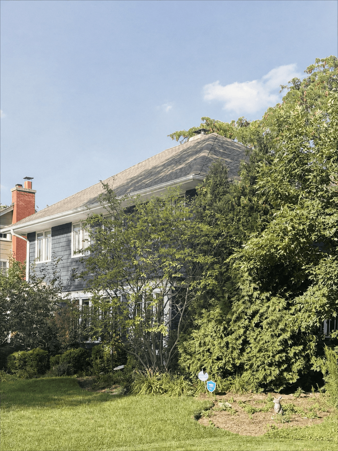 Before: a beautiful historic Chicago home with good bones, but the front garden was overgrown and hiding the architecture.