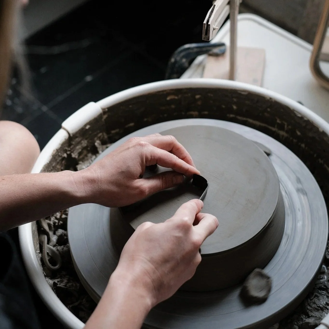 Pottery membership - someone at the pottery wheel making their own pots, Macclesfield, Cheshire