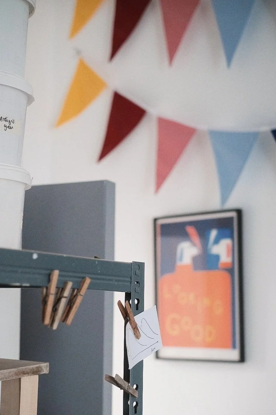 Shelves and wall art in a pottery studio in Macclesfield