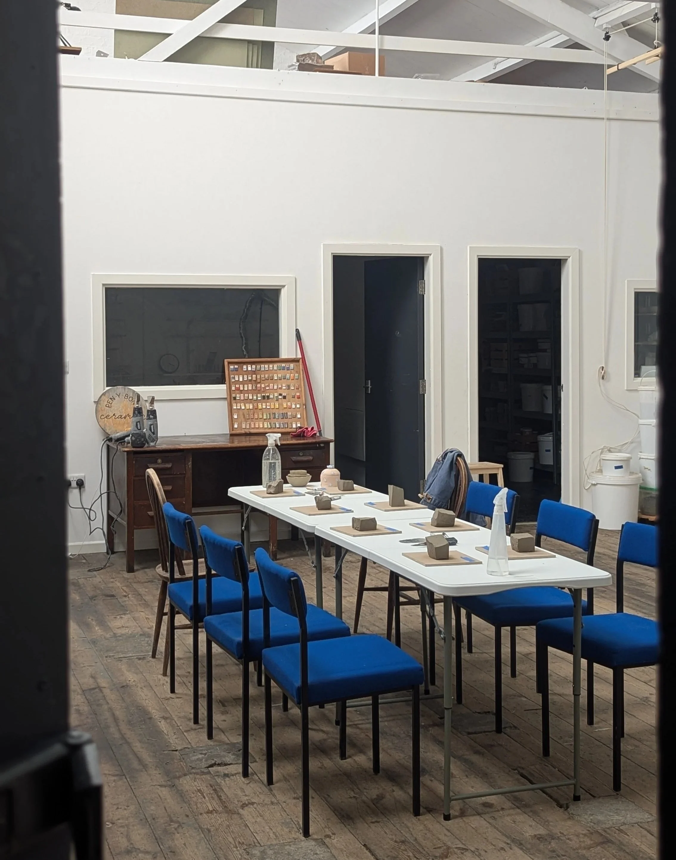 Pen-y-bont pottery studio in Macclesfield, tables set up for a group pottery workshop