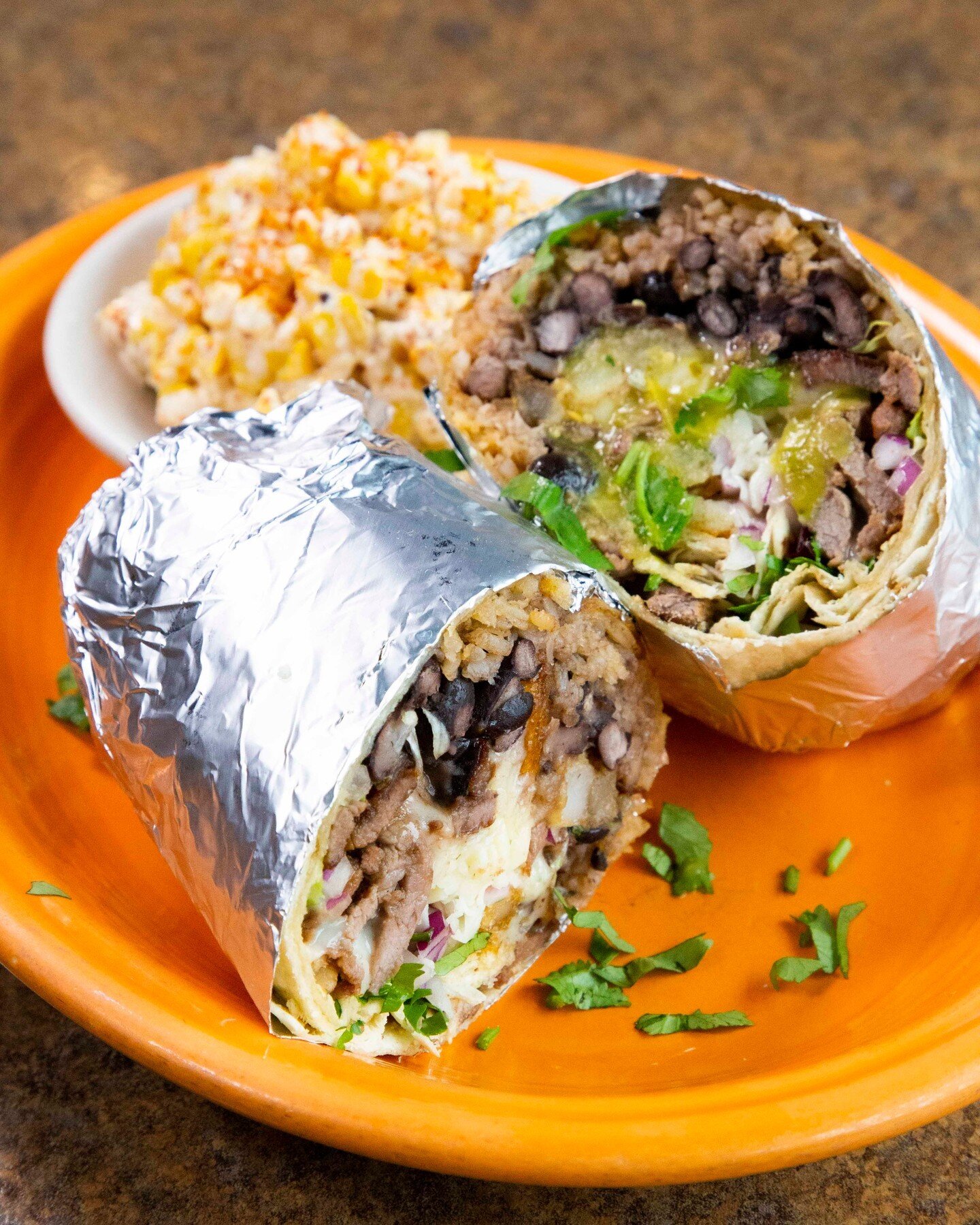 Fan of burritos? 🌯 You have to try our Barbacoa de Res. Stuffed with beef barbacoa, rice, beans, onions, cilantro, salsa verde and roja and cheese, served with &lsquo;esquite&rsquo; street corn on a bowl 🤤

#monterreymexgrill #mexicanfood #comidame