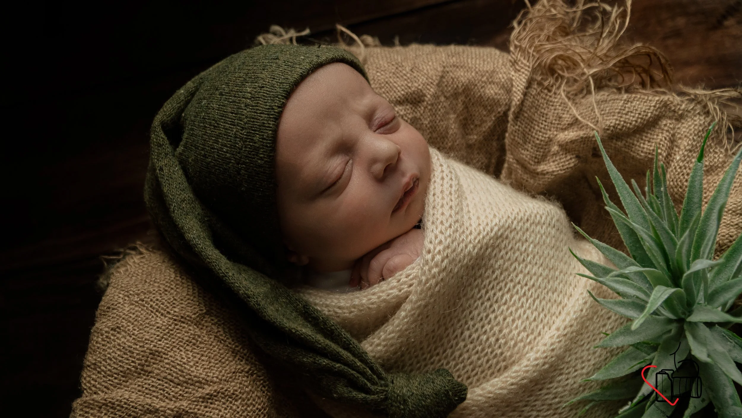 baby boy photoshoot at home, neutral theme, green hat