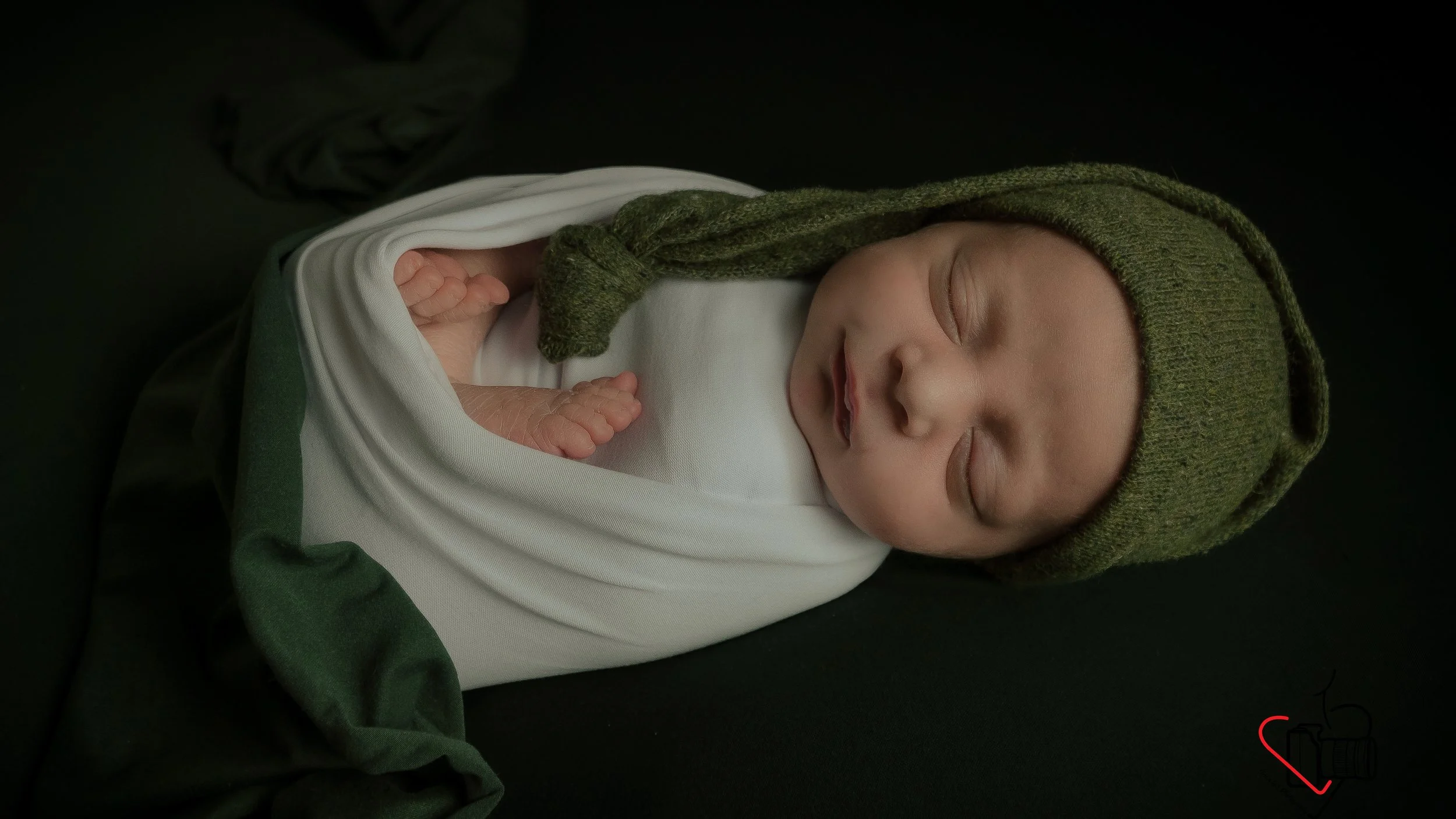 newborn photoshoot at home green color theme, Hampshire and West Sussex, UK