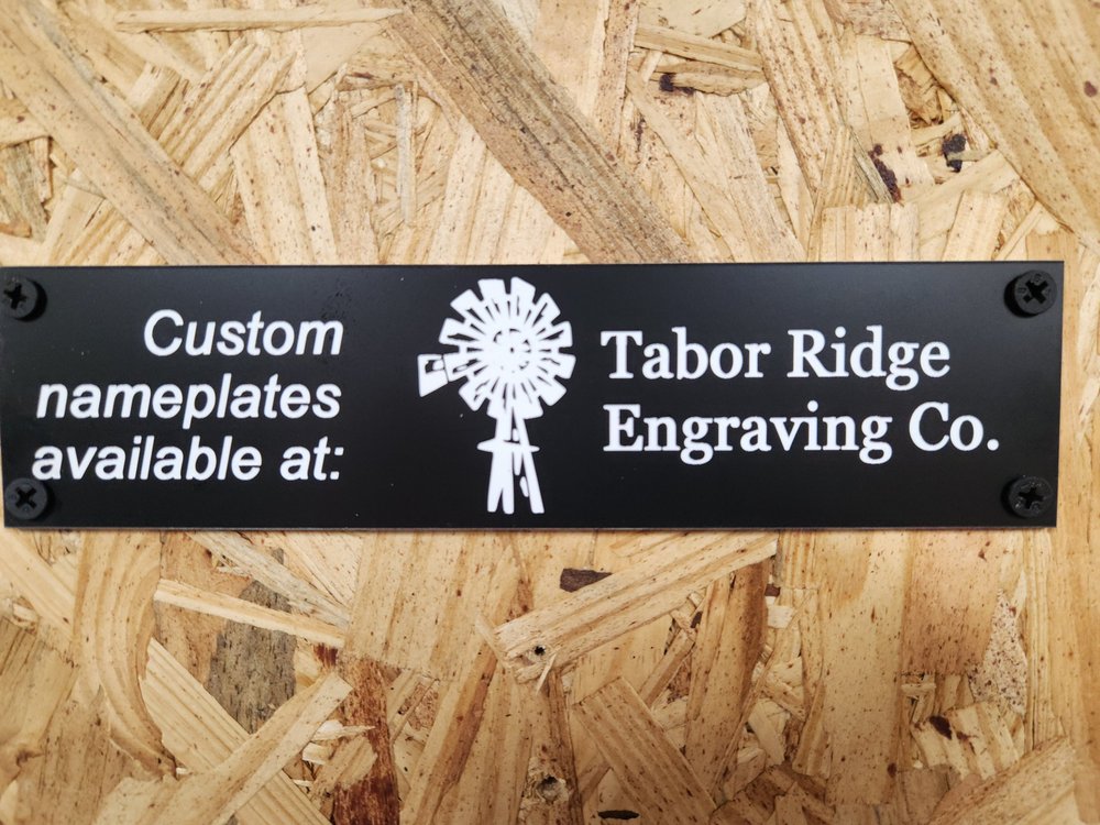Custom laser-engraved acrylic nameplates and stencils
