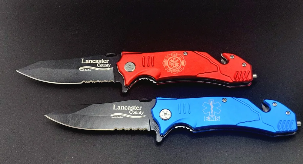 Custom laser-engraved Bison River Rescue Knives in six handle colors