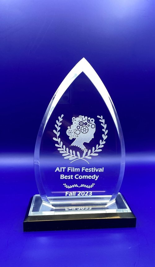 Laser-engraved clear acrylic award close-up