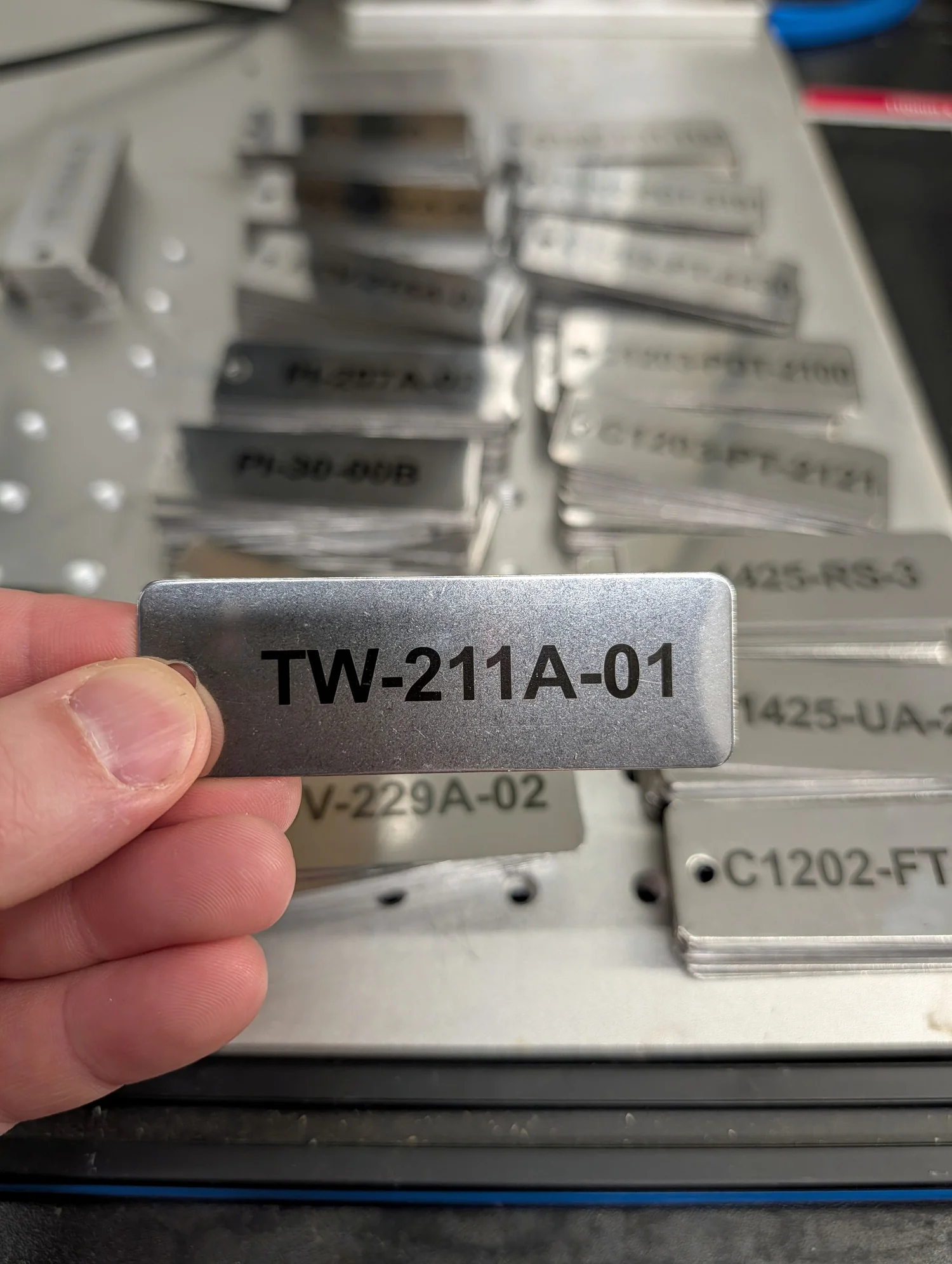 Laser-engraved stainless steel identification tags for industrial use